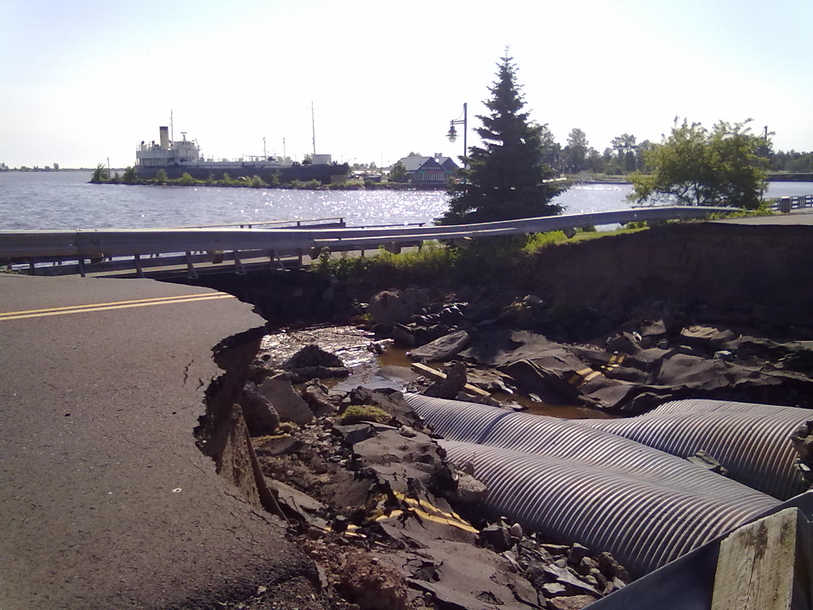 Walker visits Superior after storms