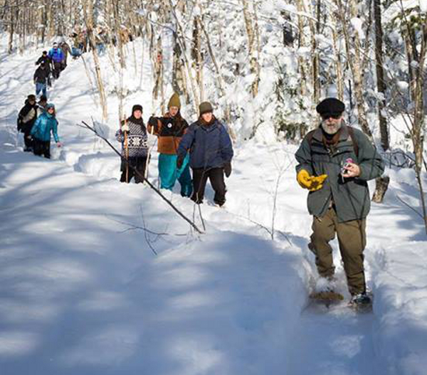 A small group of people snowshoed in the off-limits area near the proposed mine site in the Penokee Hills. Photo: Justus Grunow