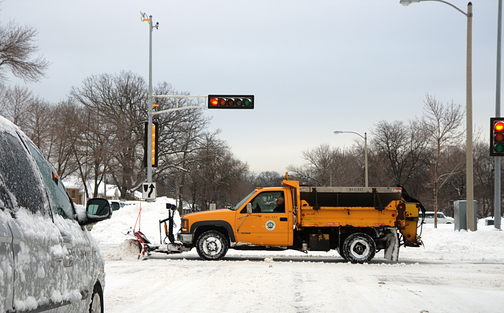 Plow truck with salt spreader, in Milwaukee