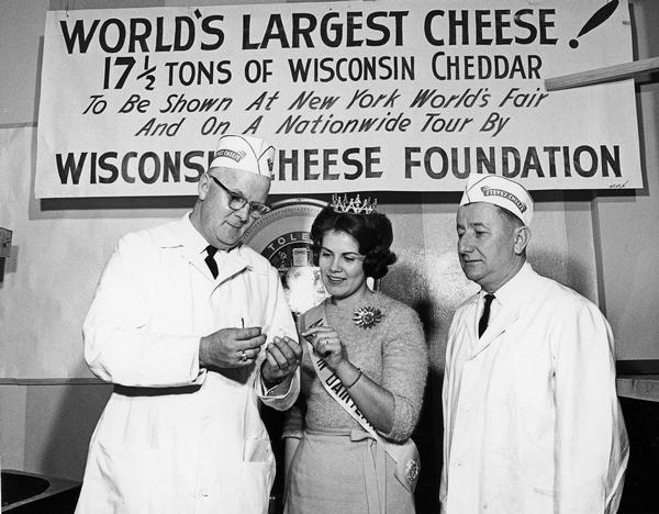 Alice in Dairyland samples world's largest cheese
