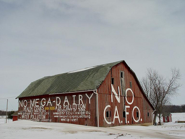 barn with protest signs