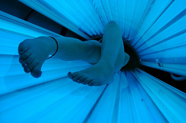 feet in a tanning bed