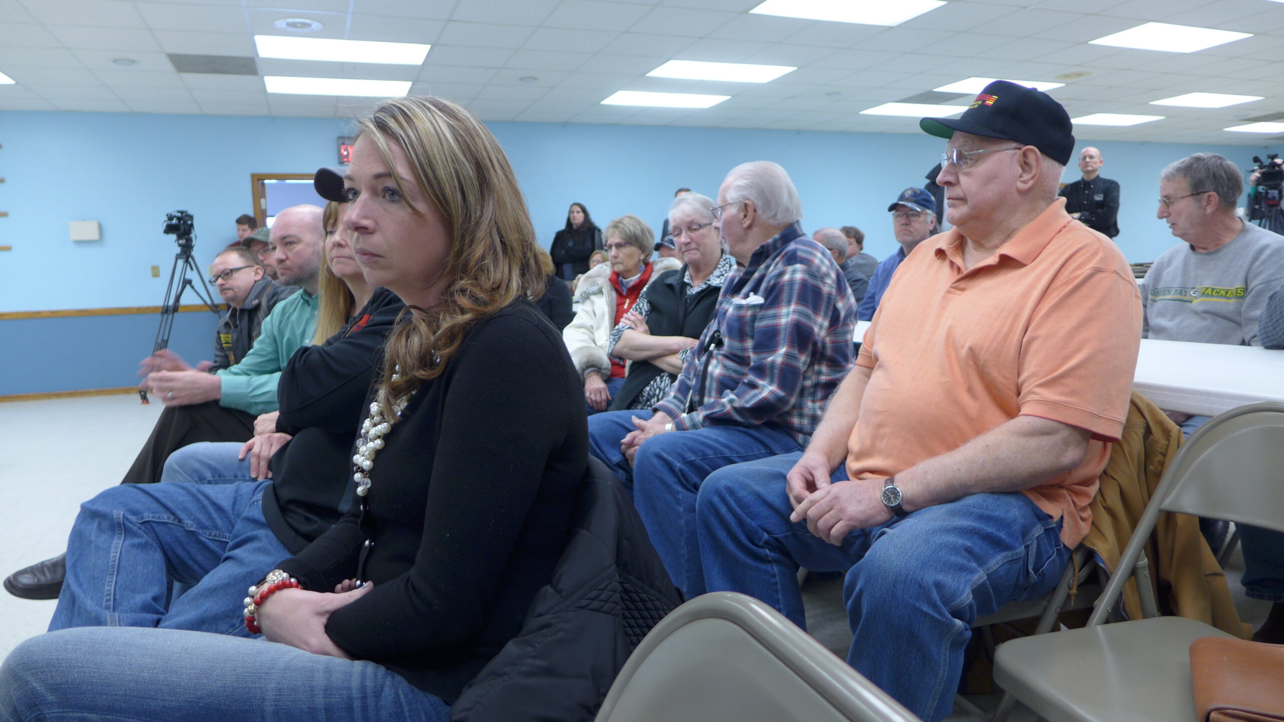 Jason Simcakoski's widow, Heather (left), listens to veterans and Tomah VA staff share their experiences with the medical center at a state lawmaker town hall meeting held in Tomah in February 2015.