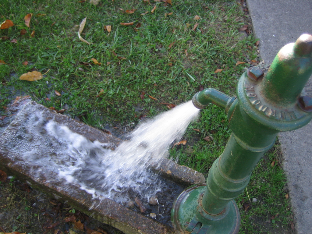 Water Coming Out Of A Pump