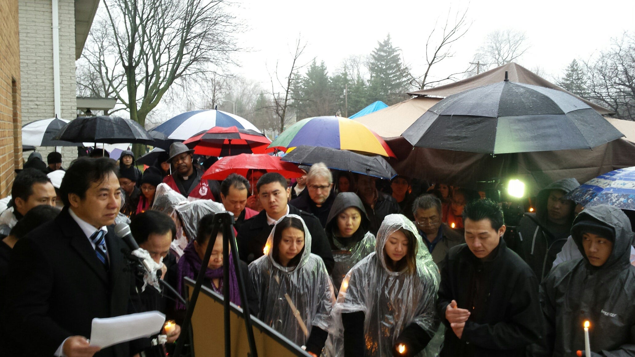 Pao Vue speaks at the memorial service.