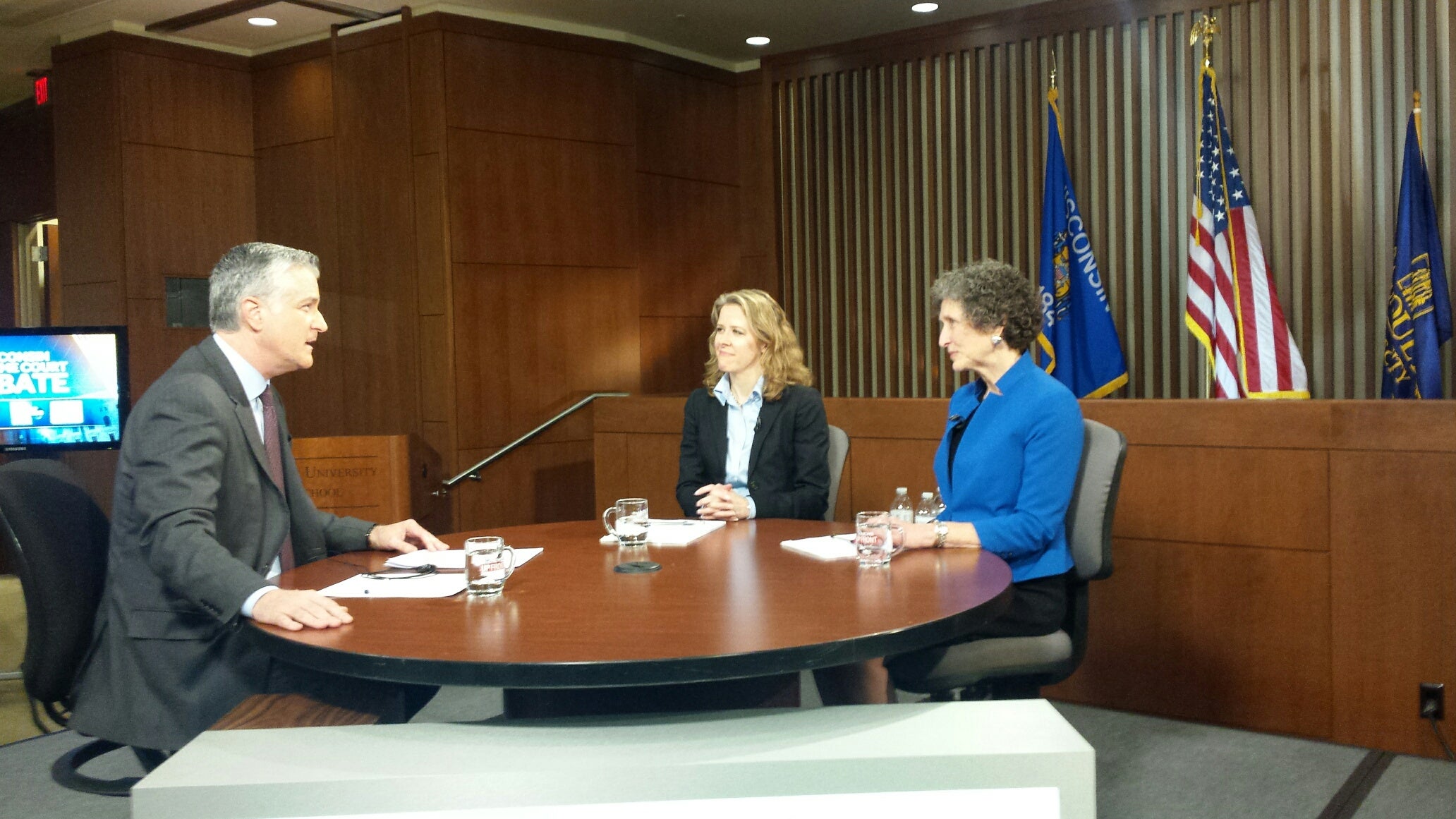 Moderator Mike Gousha, Wisconsin Supreme Court Justice Rebecca Bradley, and State Appeals Court Judge JoAnne Kloppenburg.