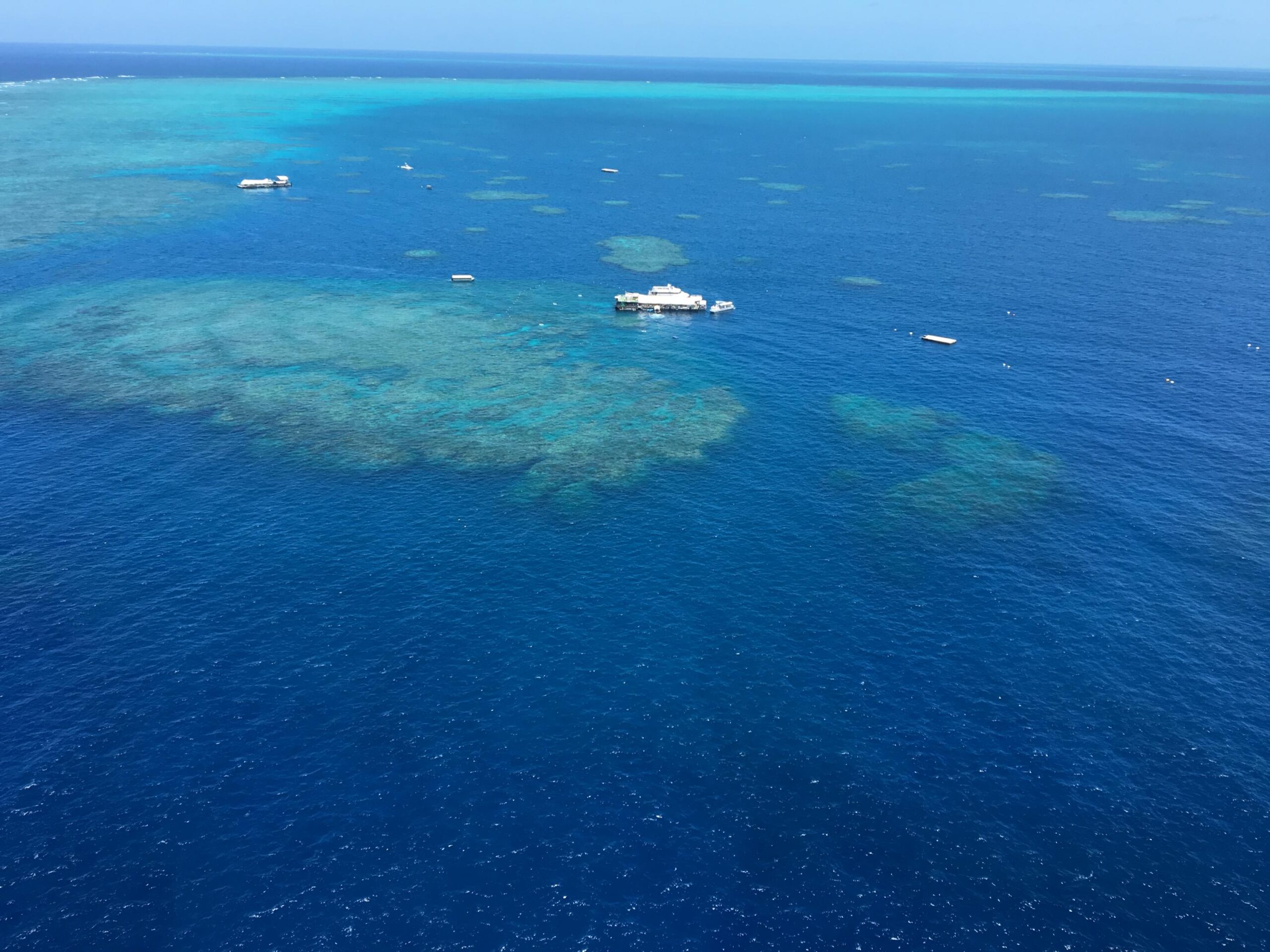 Helicopter view over Great Barrier Reef near Cairns, AU - Photo by Allen Rieland