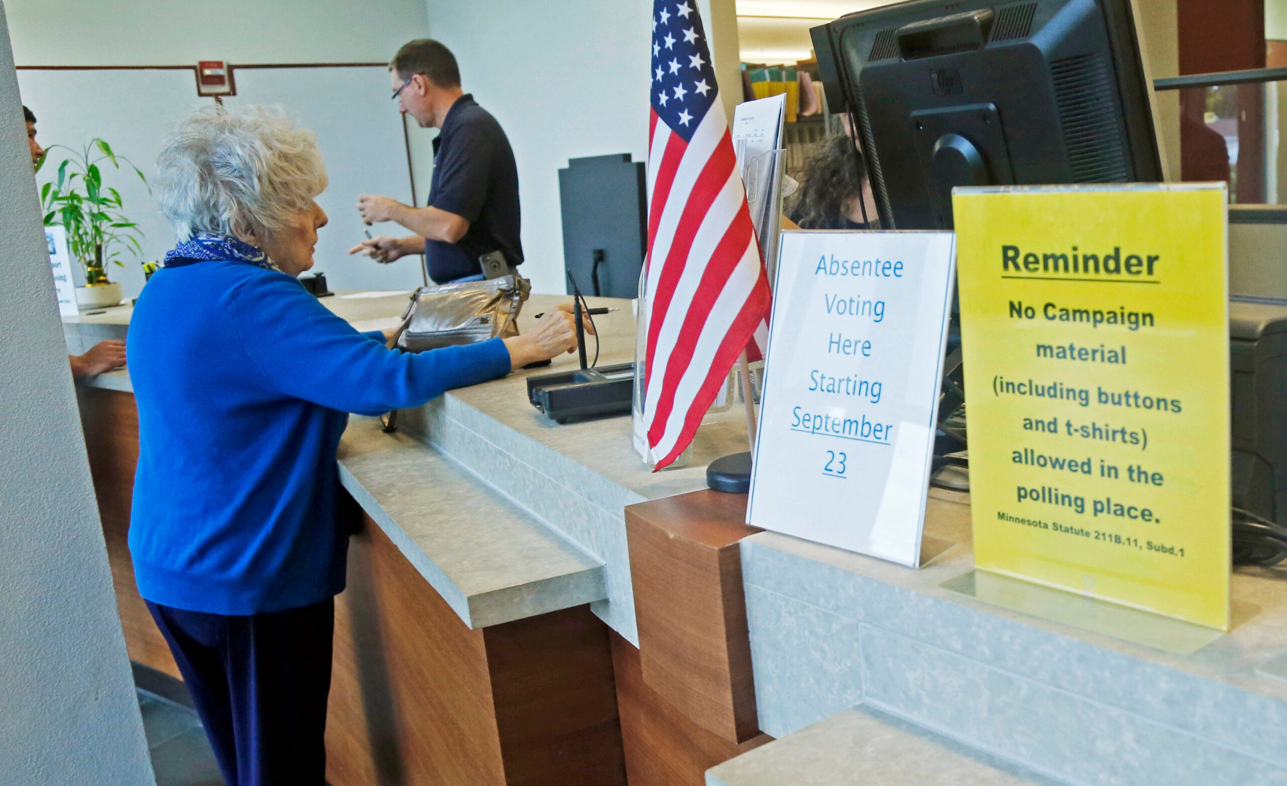 Woman signing up to vote