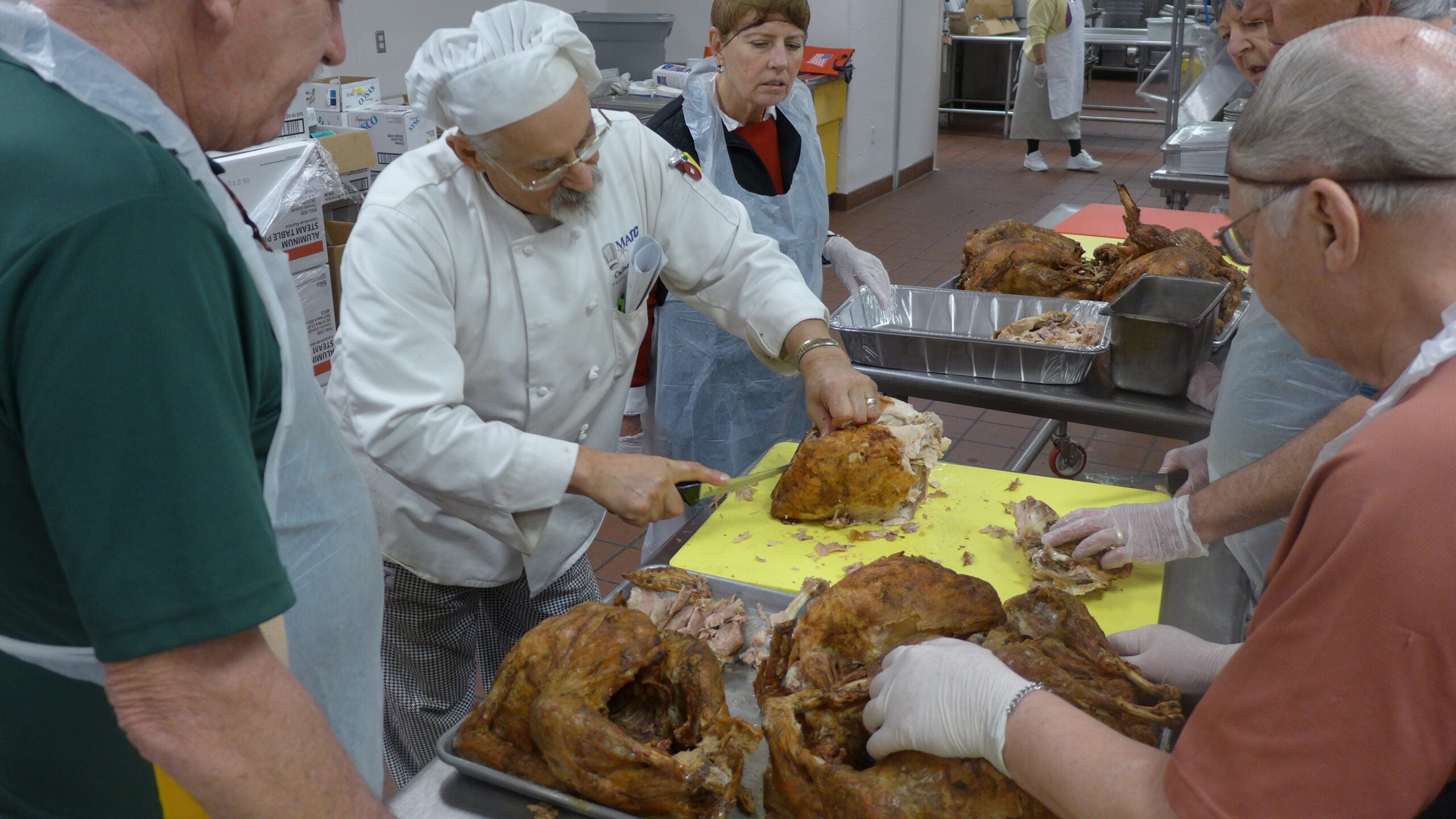 Man showing how to cut turkey