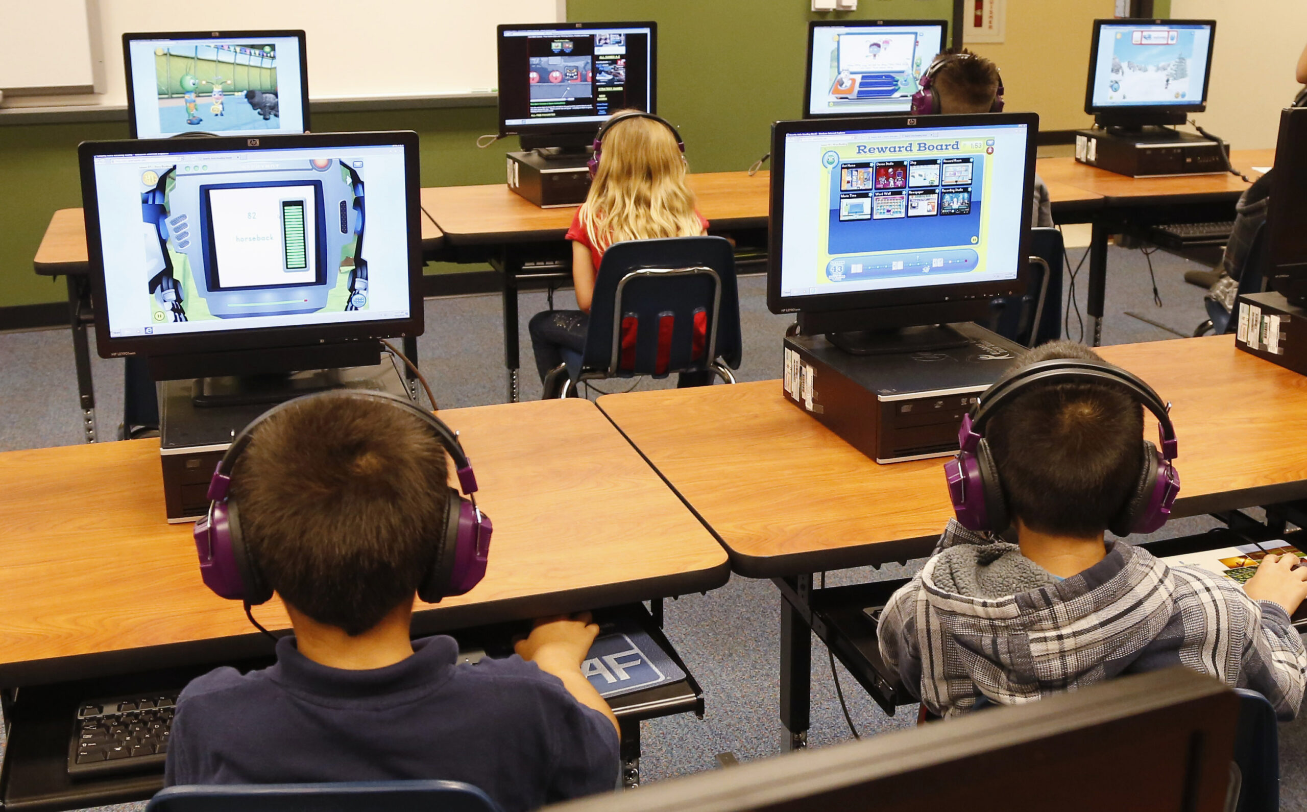 Children on computers in a classroom