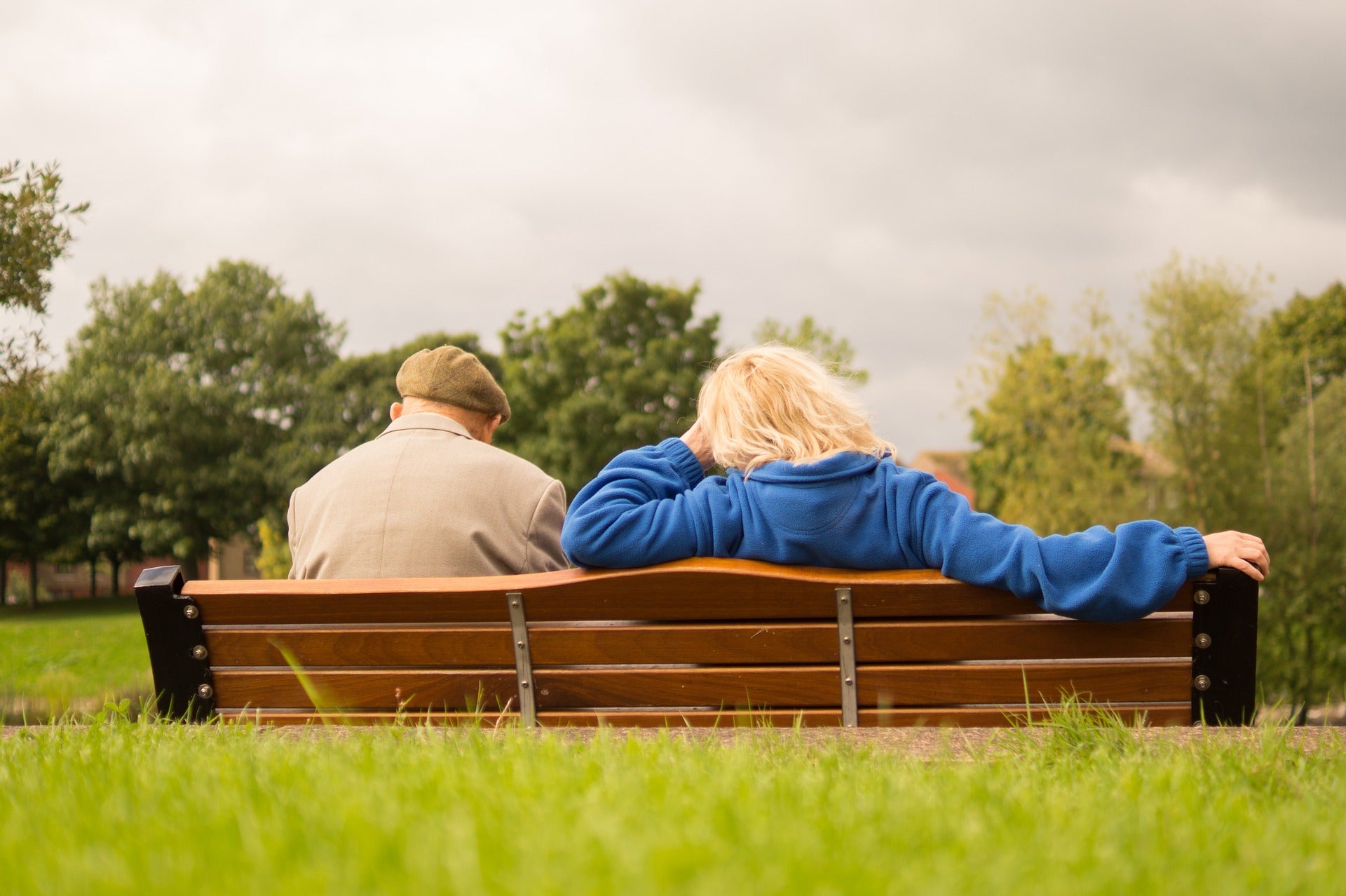 senior on park bench