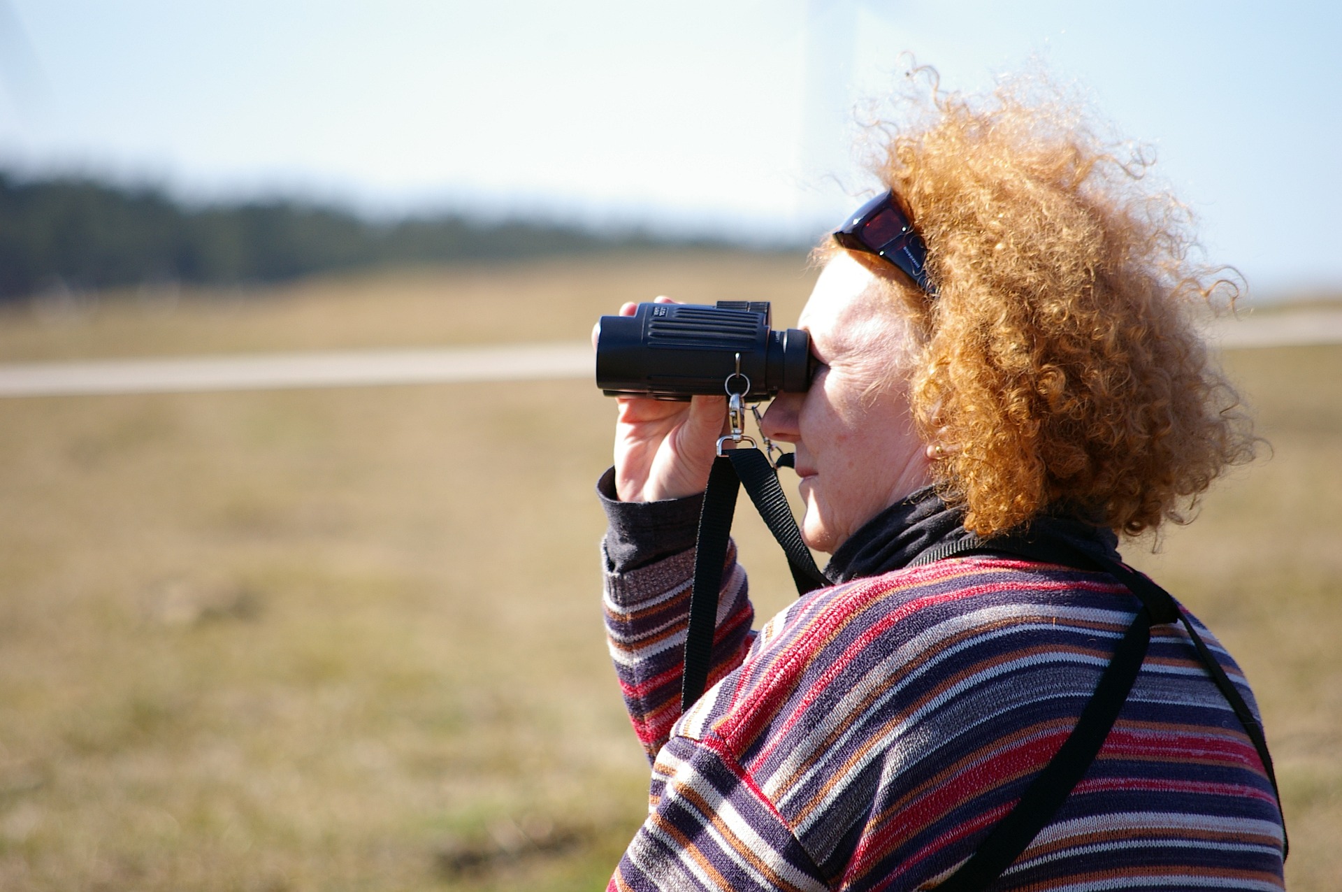 bird watcher with binoculars