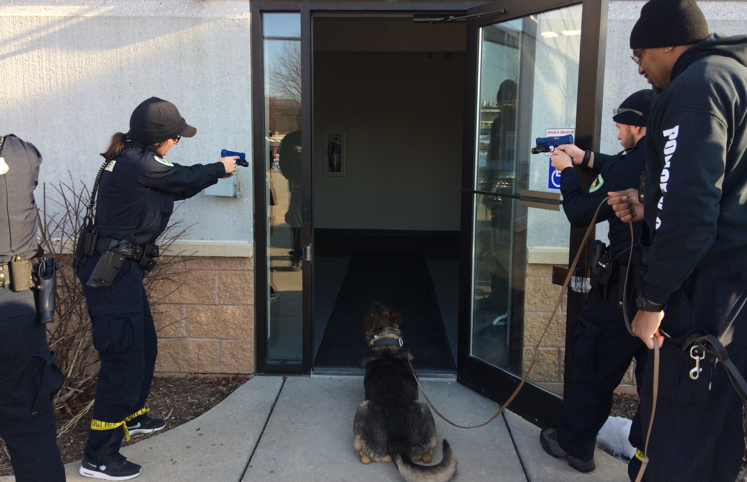Madison Police recruits Clare Gloede and Rok Locksley practice working with a police K9.