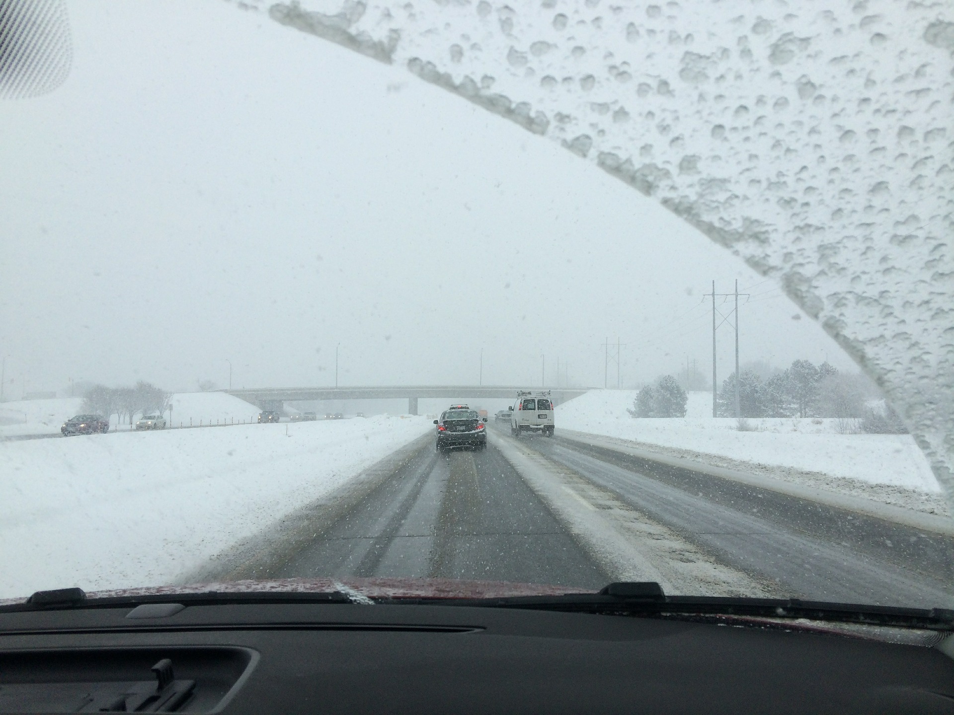 winter highway through windsheild