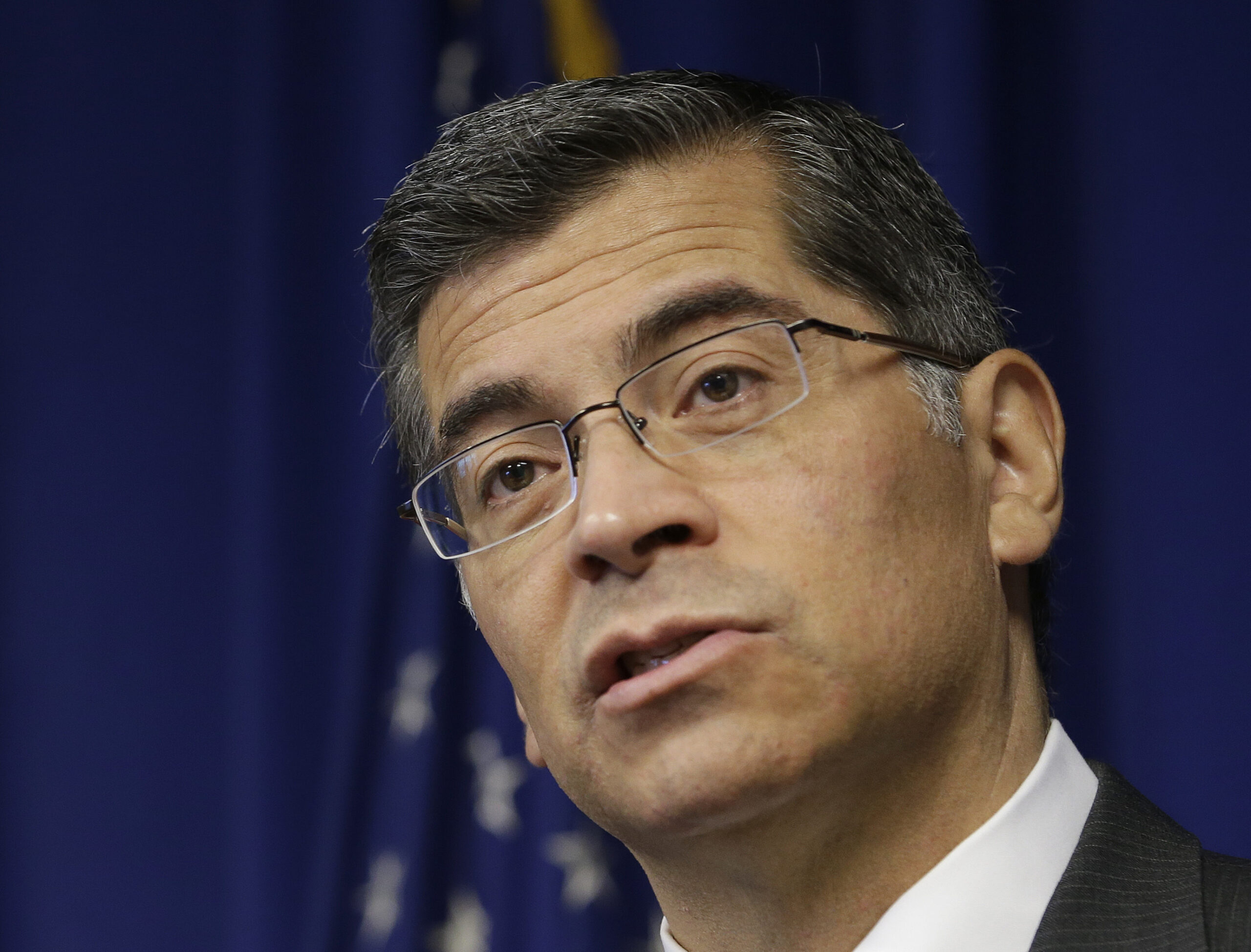 California Attorney General Xavier Becerra speaks at a news conference