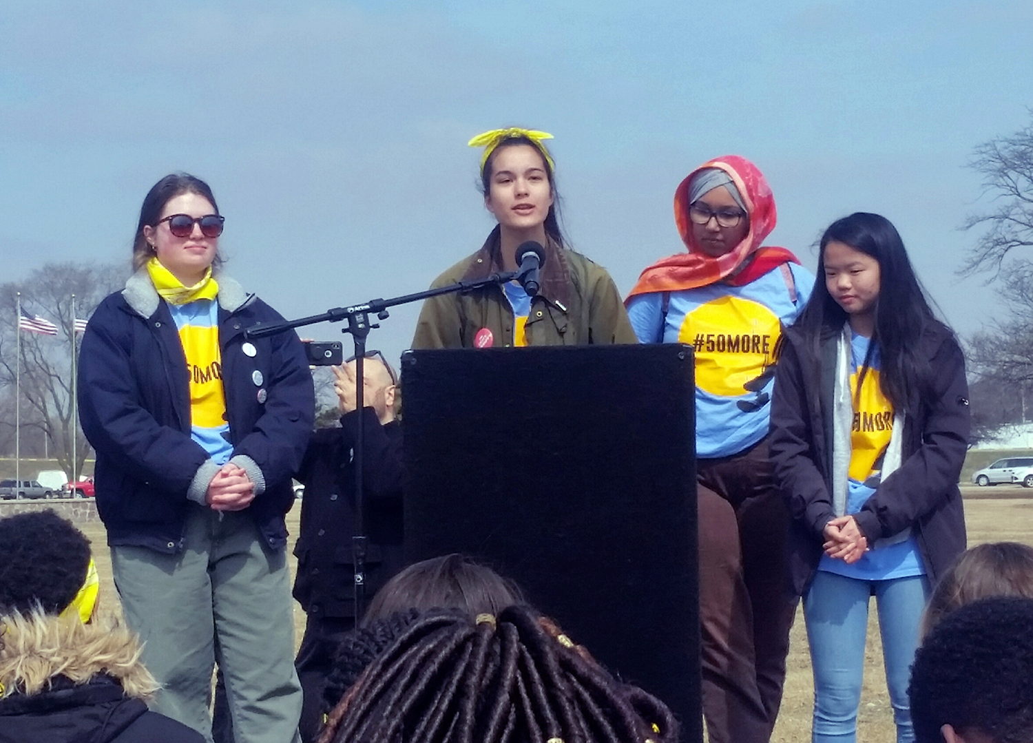 Student marchers speak at a rally