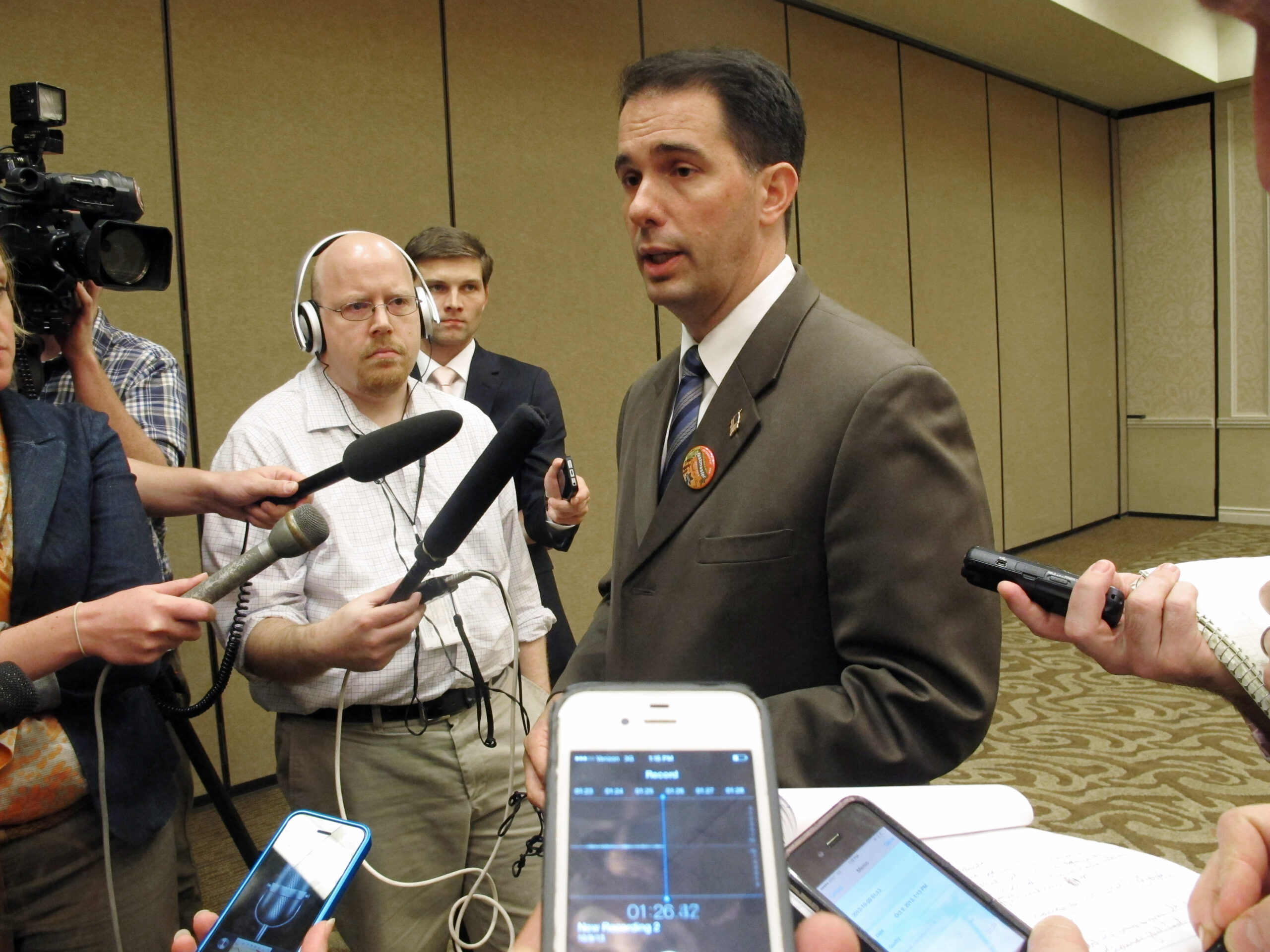 Gov. Walker talks to reporters in 2013
