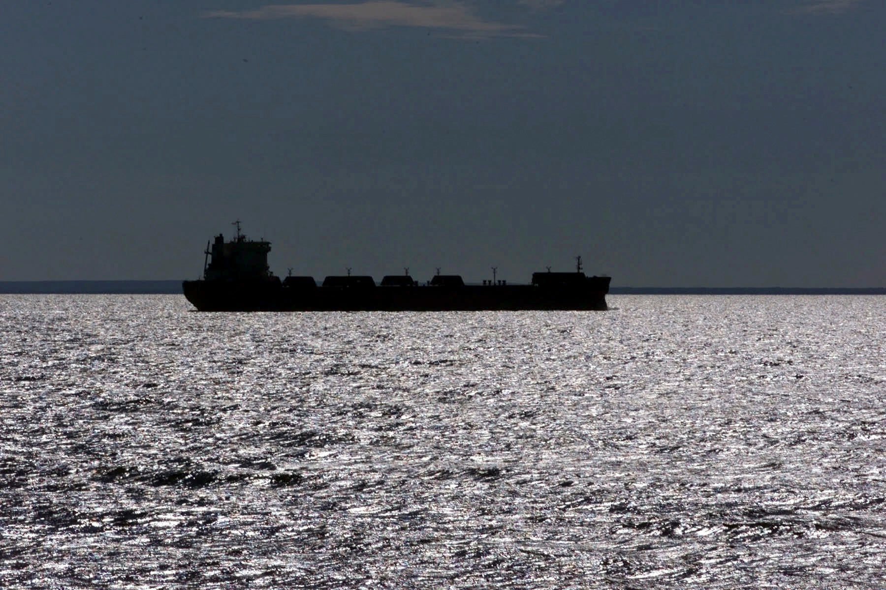 freighter silhouetted in Lake Superior