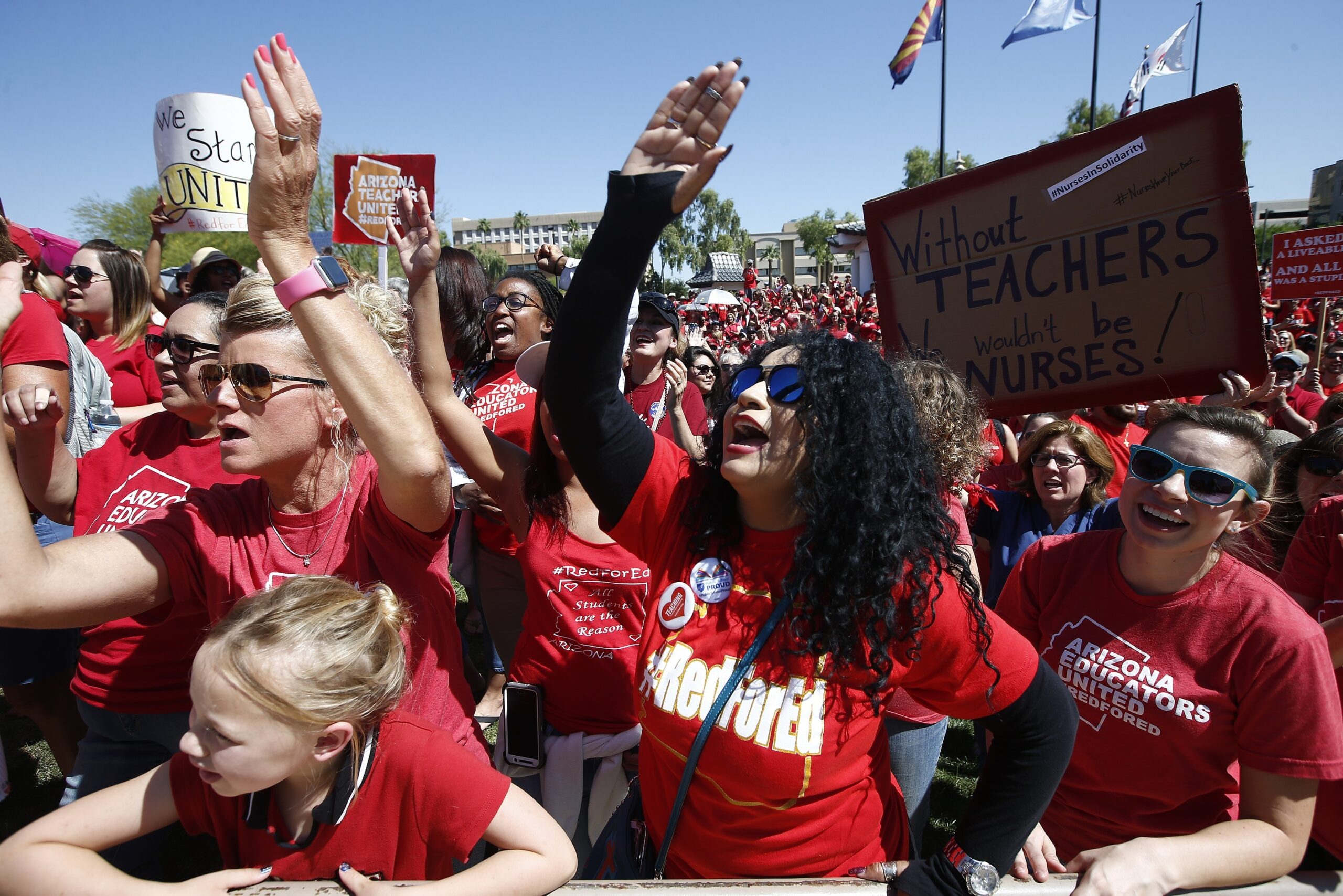 Teachers chant during continued protests at the Arizona Capitol