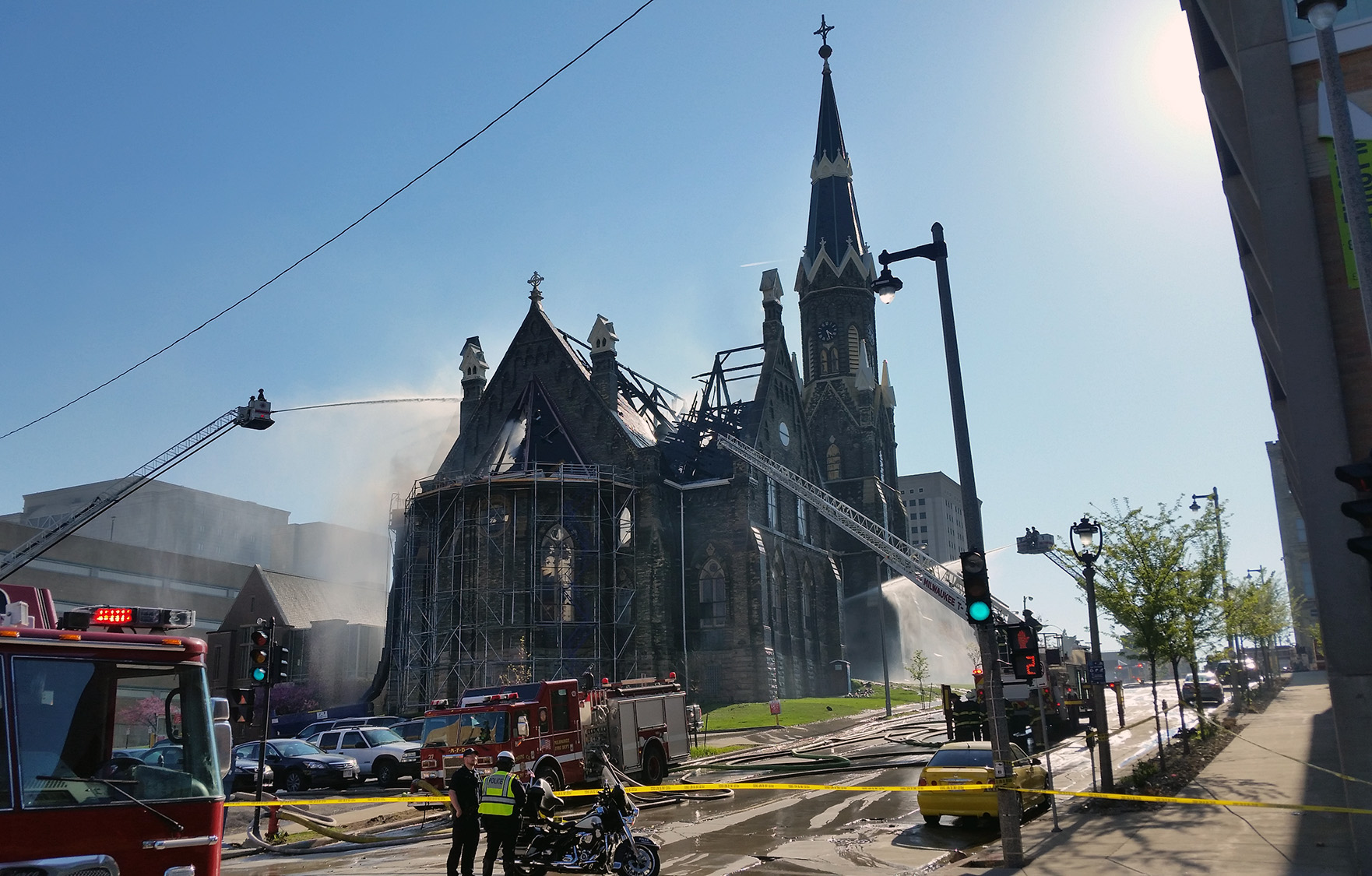 Firefighters spray church with water