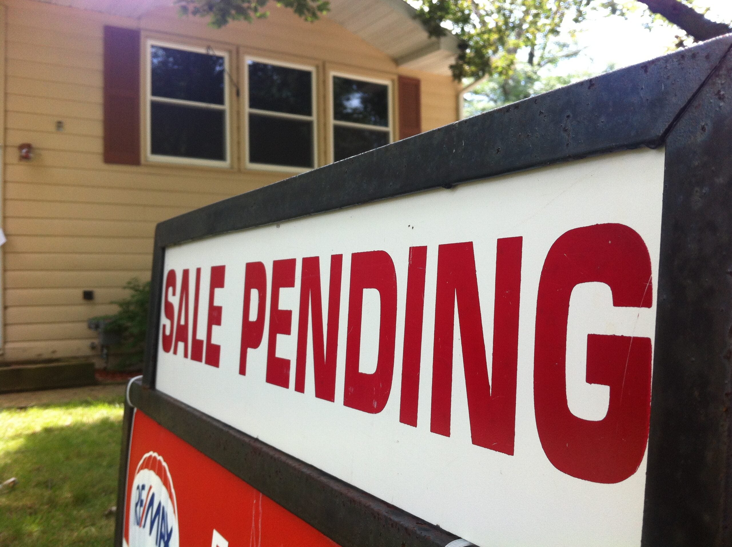 "Sale pending" sign for a house on the market