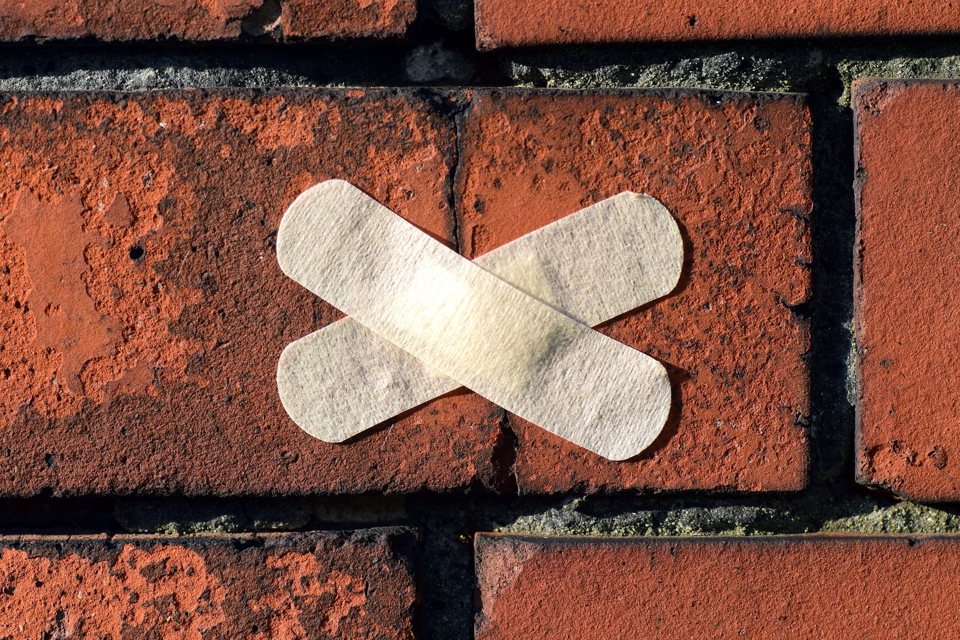 brick with bandage