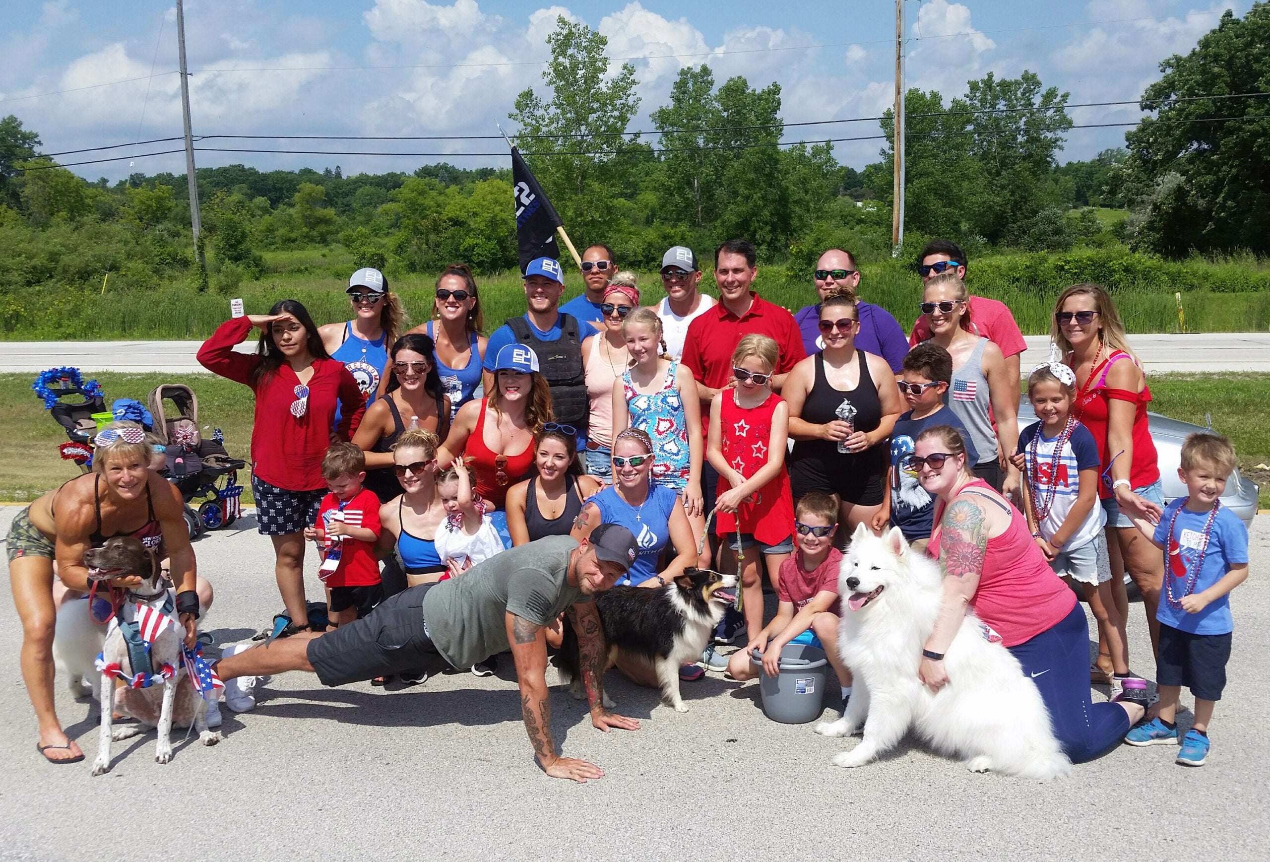 Scott Walker posing with a fitness group