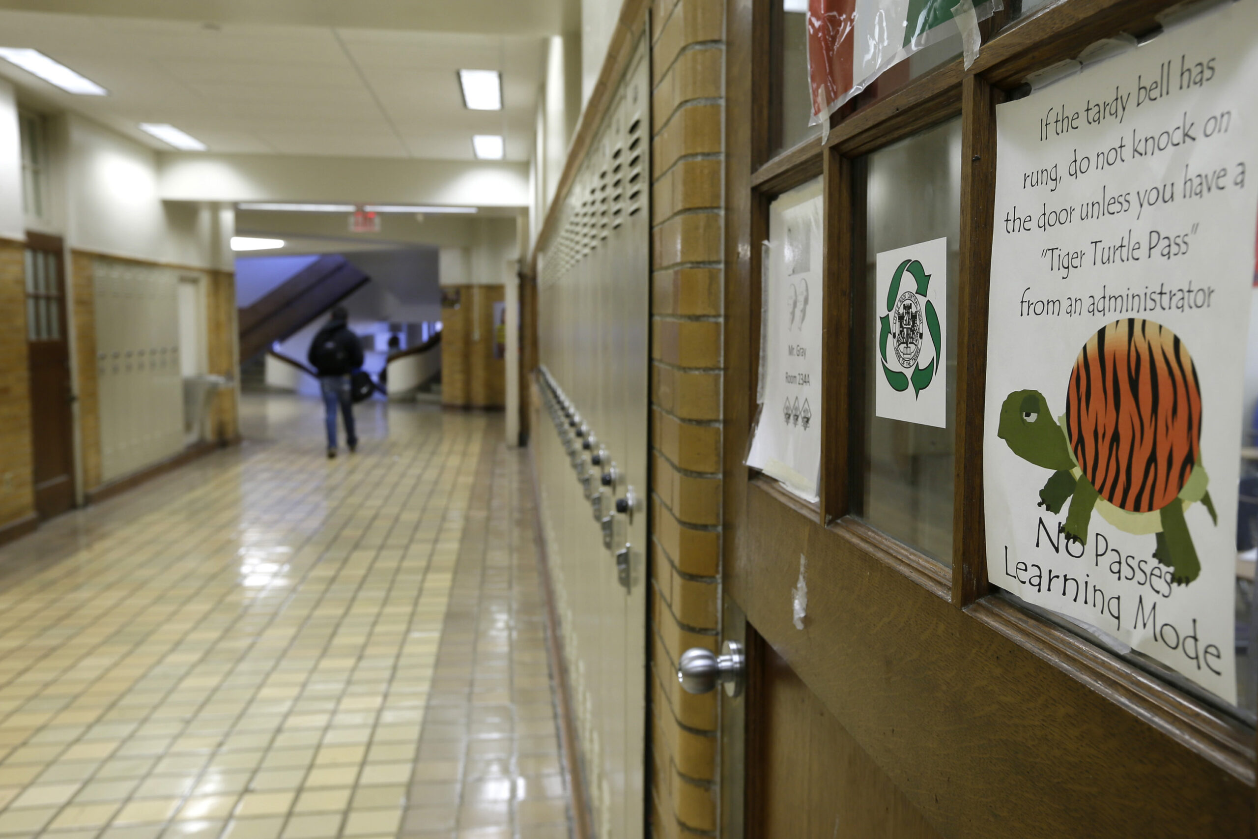 A student walks in a hallway at Little Rock Central High School