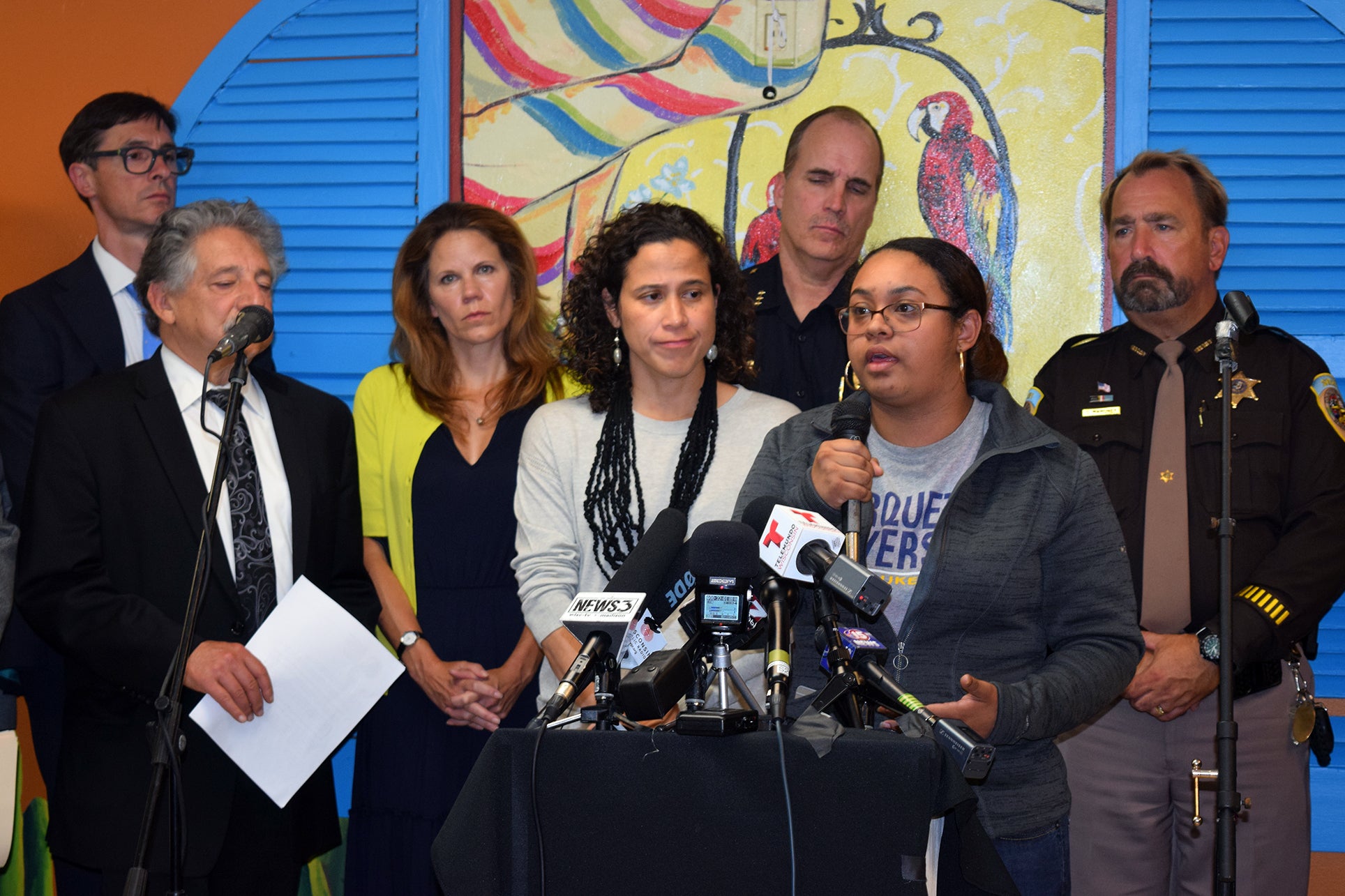 Gissell Vera speaks at a press conference at Centro Hispano