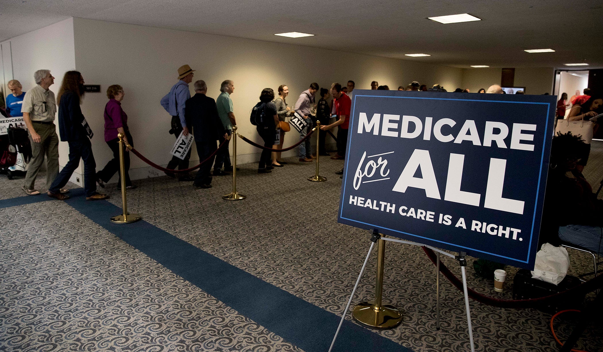 Supporters line up to get into a news conference held by Sen. Bernie Sanders