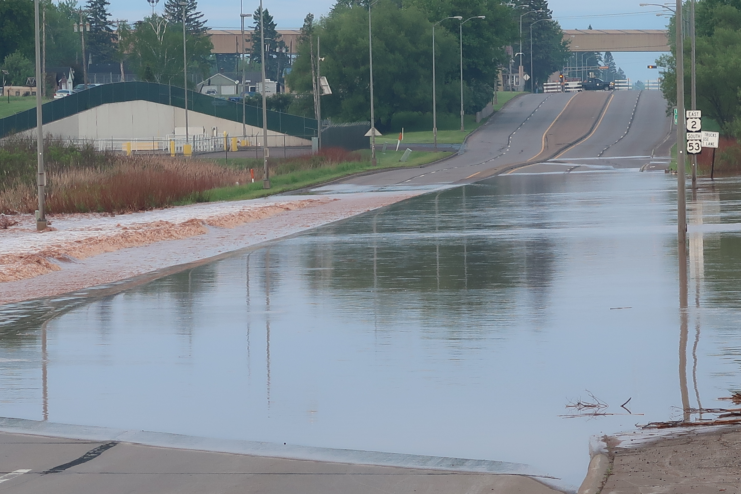 Roads closed in Superior, Wisconsin due to flooding after heavy rainfall