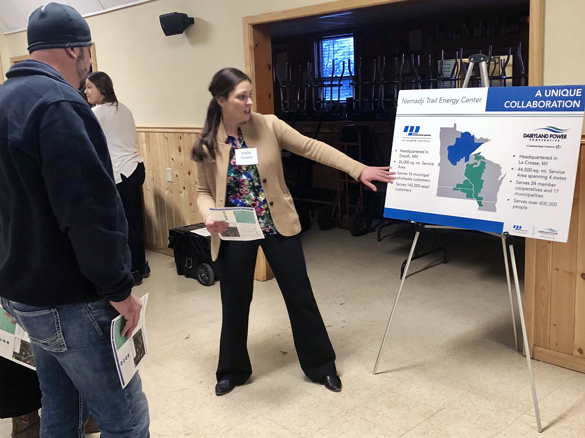 Emily Hyland talks with people about the proposed natural gas plant