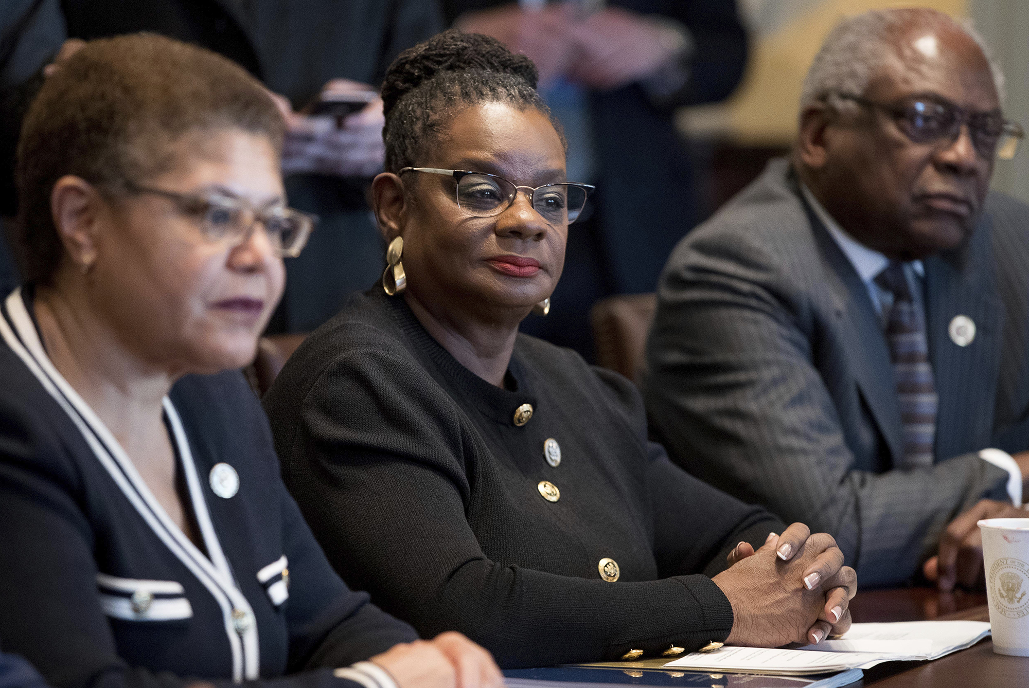Rep. Gwen Moore, D-Wis., sits with other members of the Congressional Black Caucus