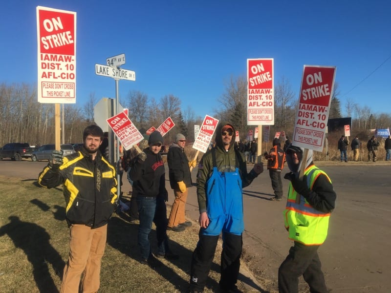 Employees picketing outside Bretting Manufacturing