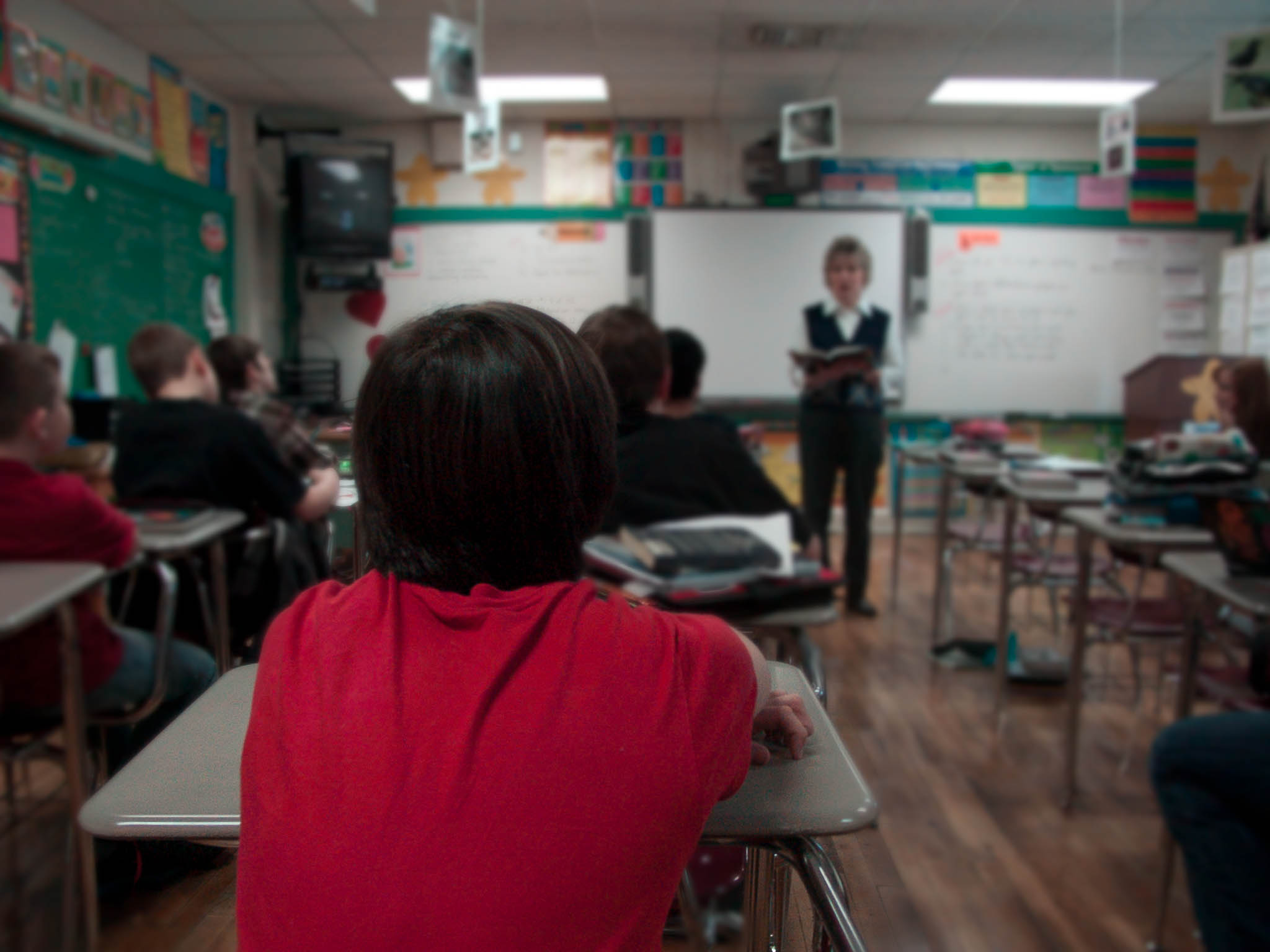 Students and a teacher in a classroom