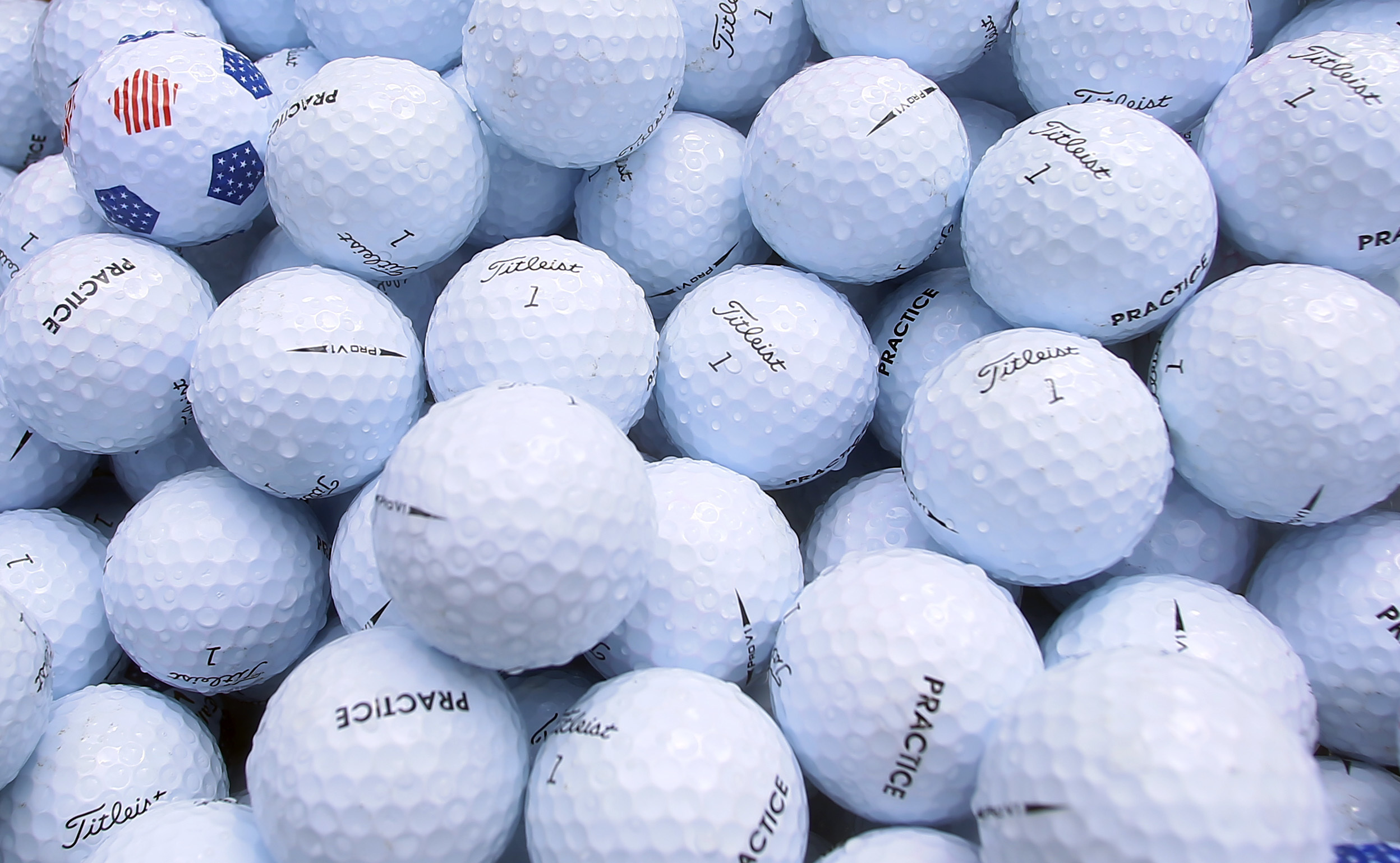 A bucket of practice golf balls