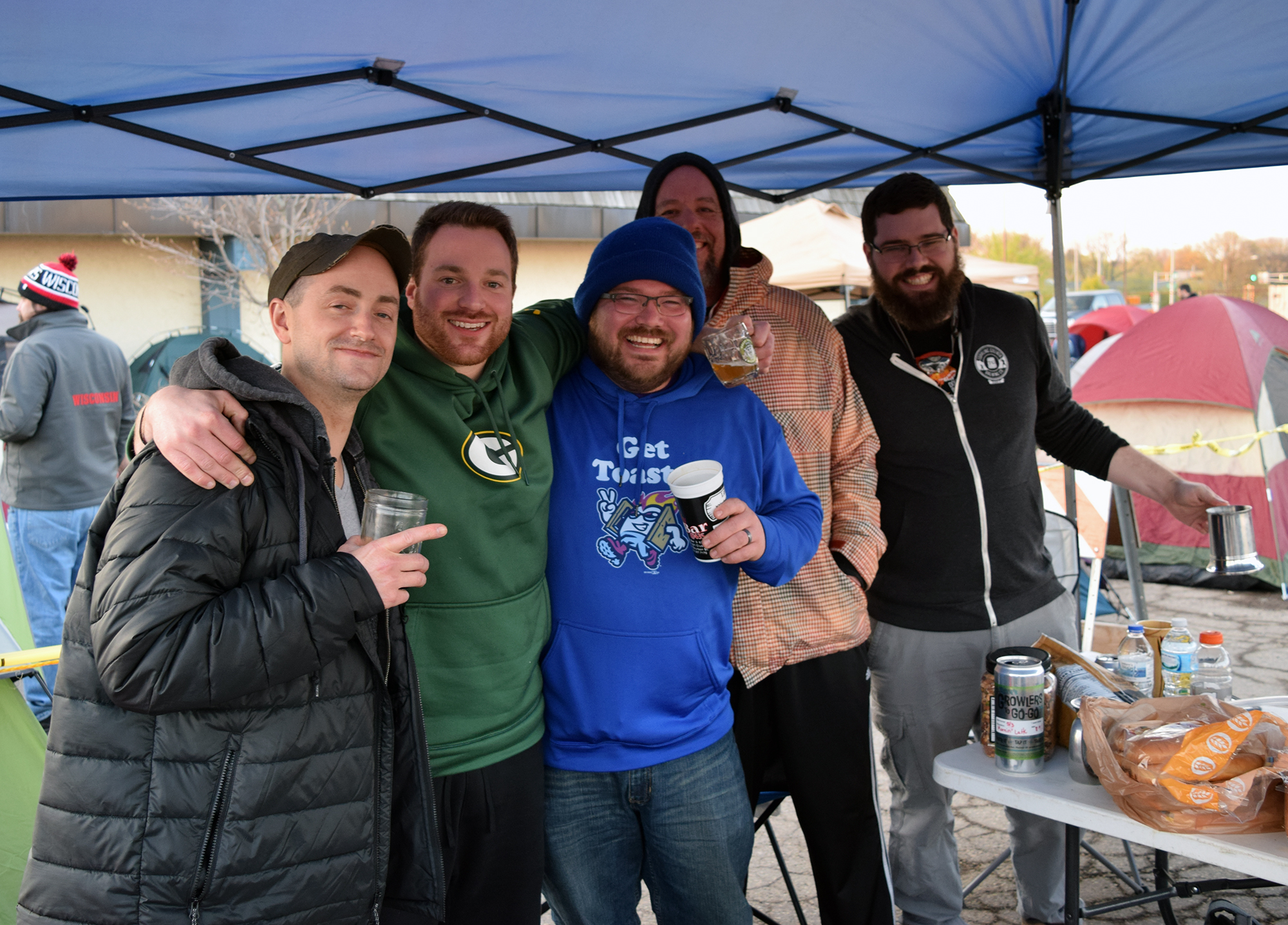 Zach Holder, left, Bill Disrud,center, Nick Courtney, right, and friends