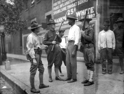 Soldiers stop black man in Washington D.C. in 1919