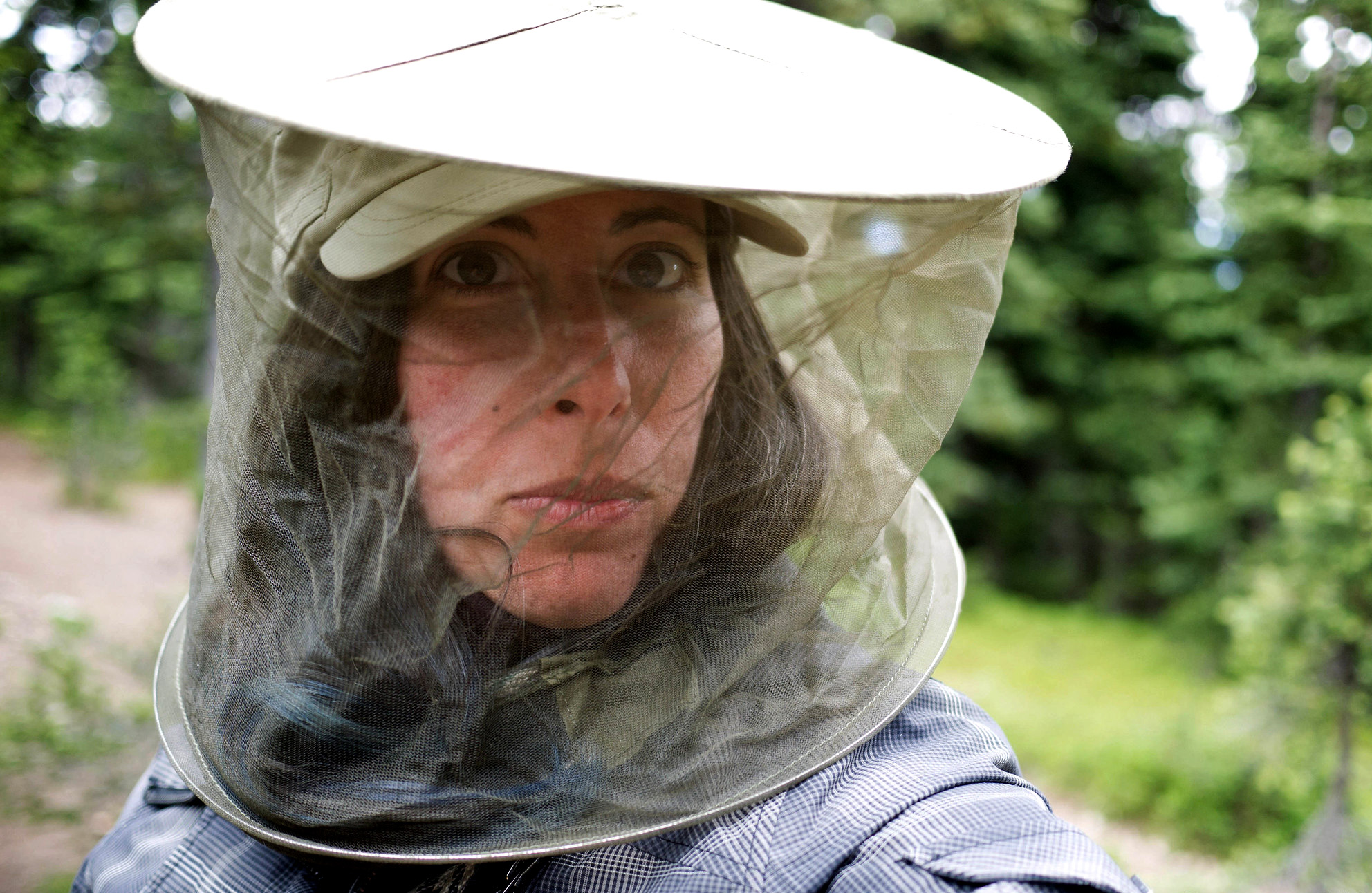 woman with insect netting around head