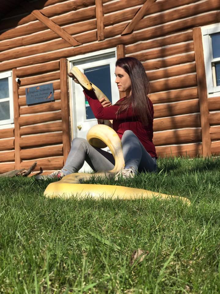 Jamie Kozloski with her Burmese python Butterscotch