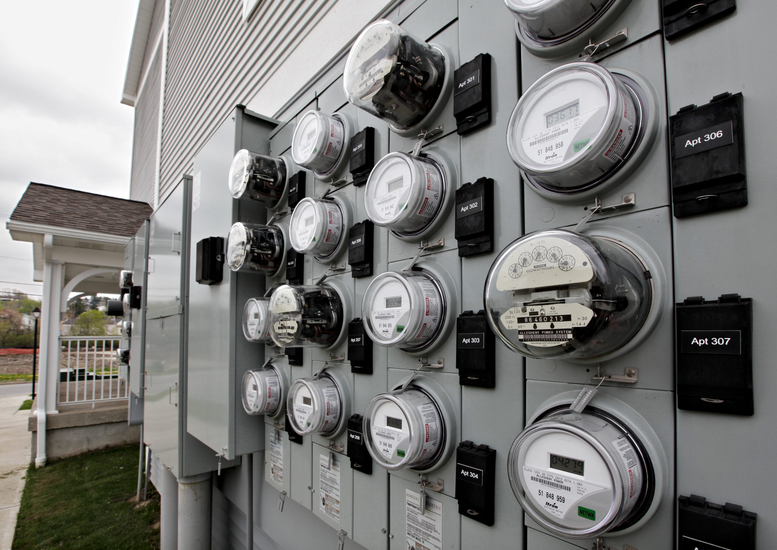 Watt-hour meters track electricity used by residents of an apartment building.