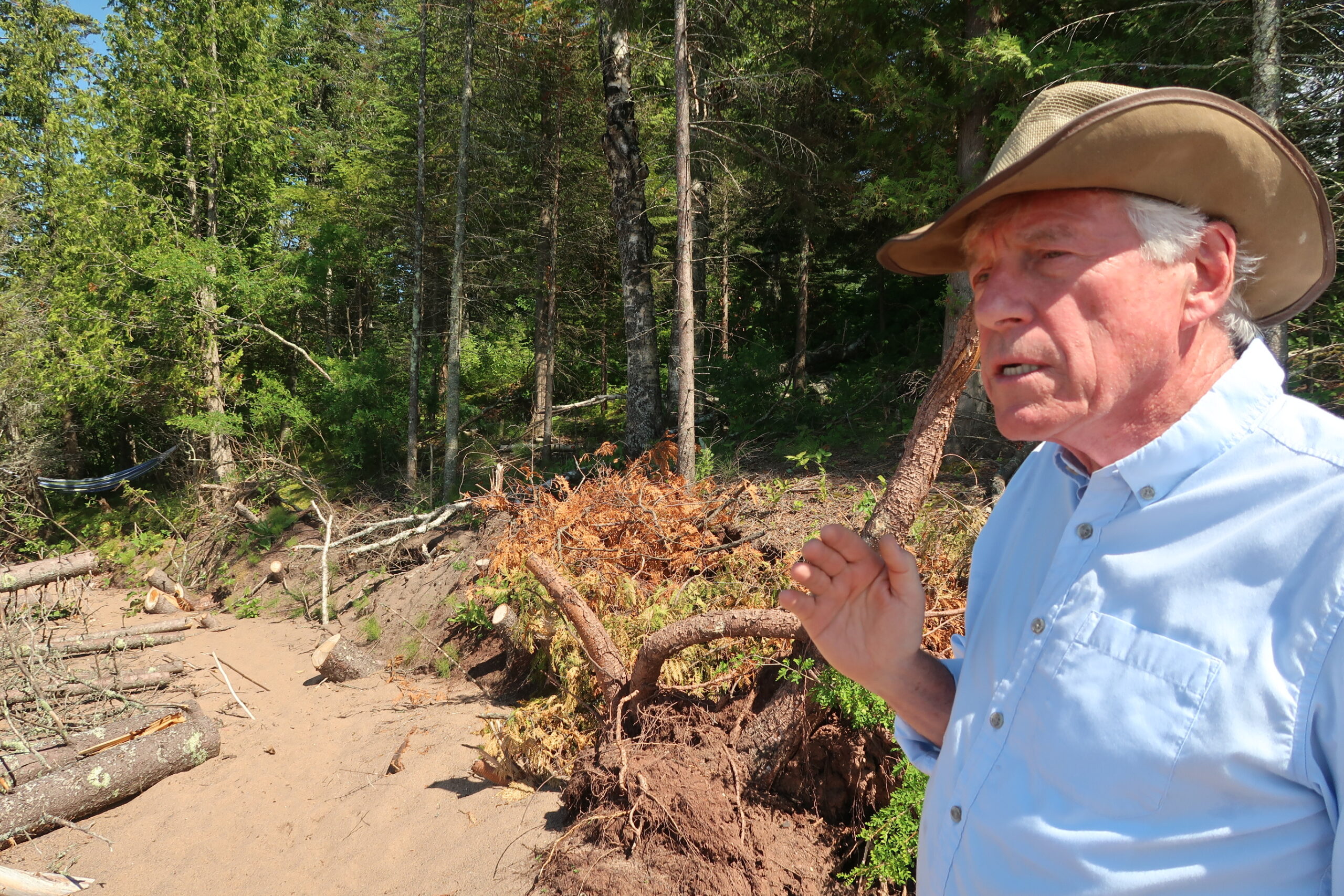 Theron O'Connor details shoreline erosion near his grandfather's cabin.