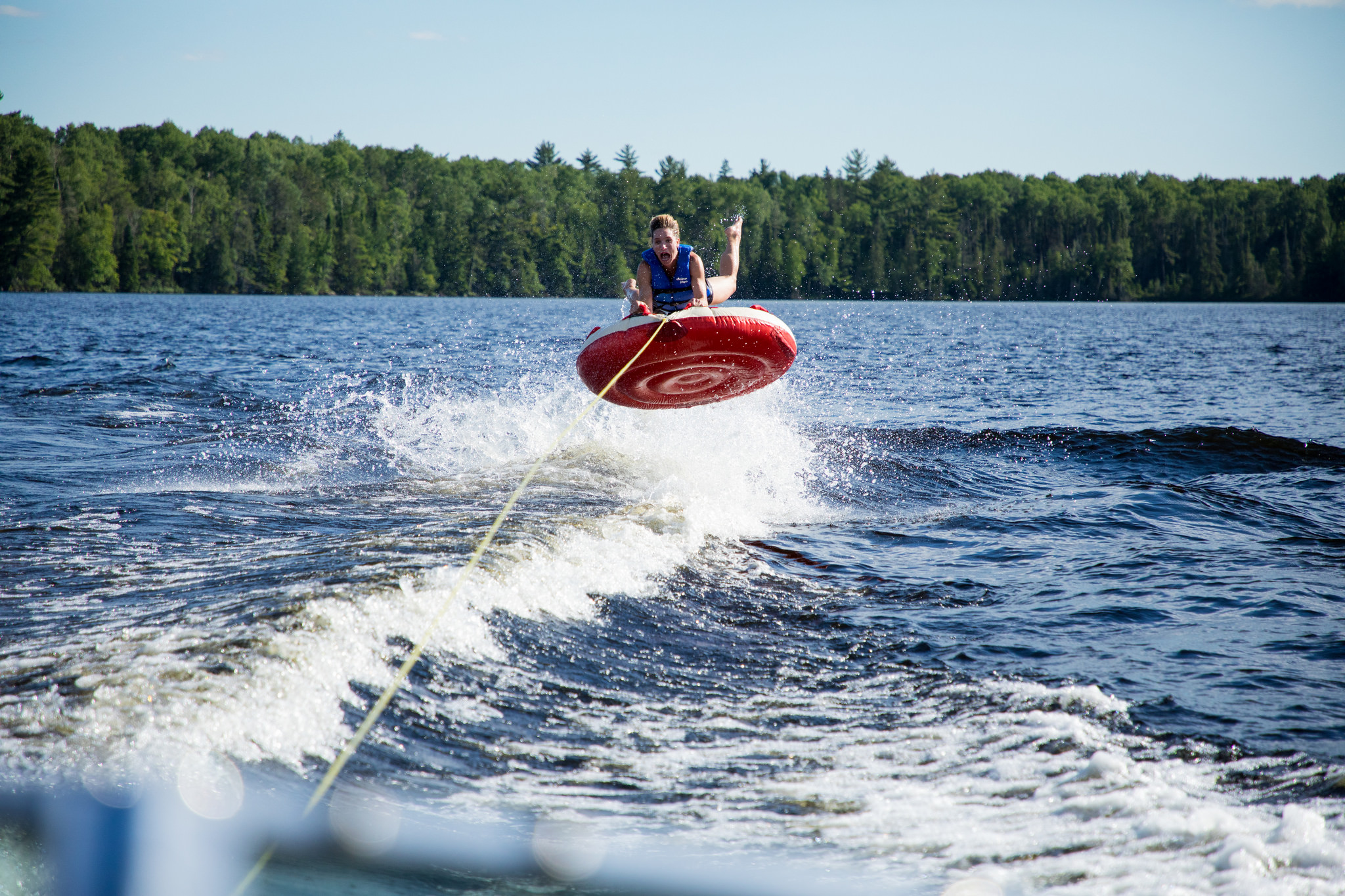 person tubing on a lake