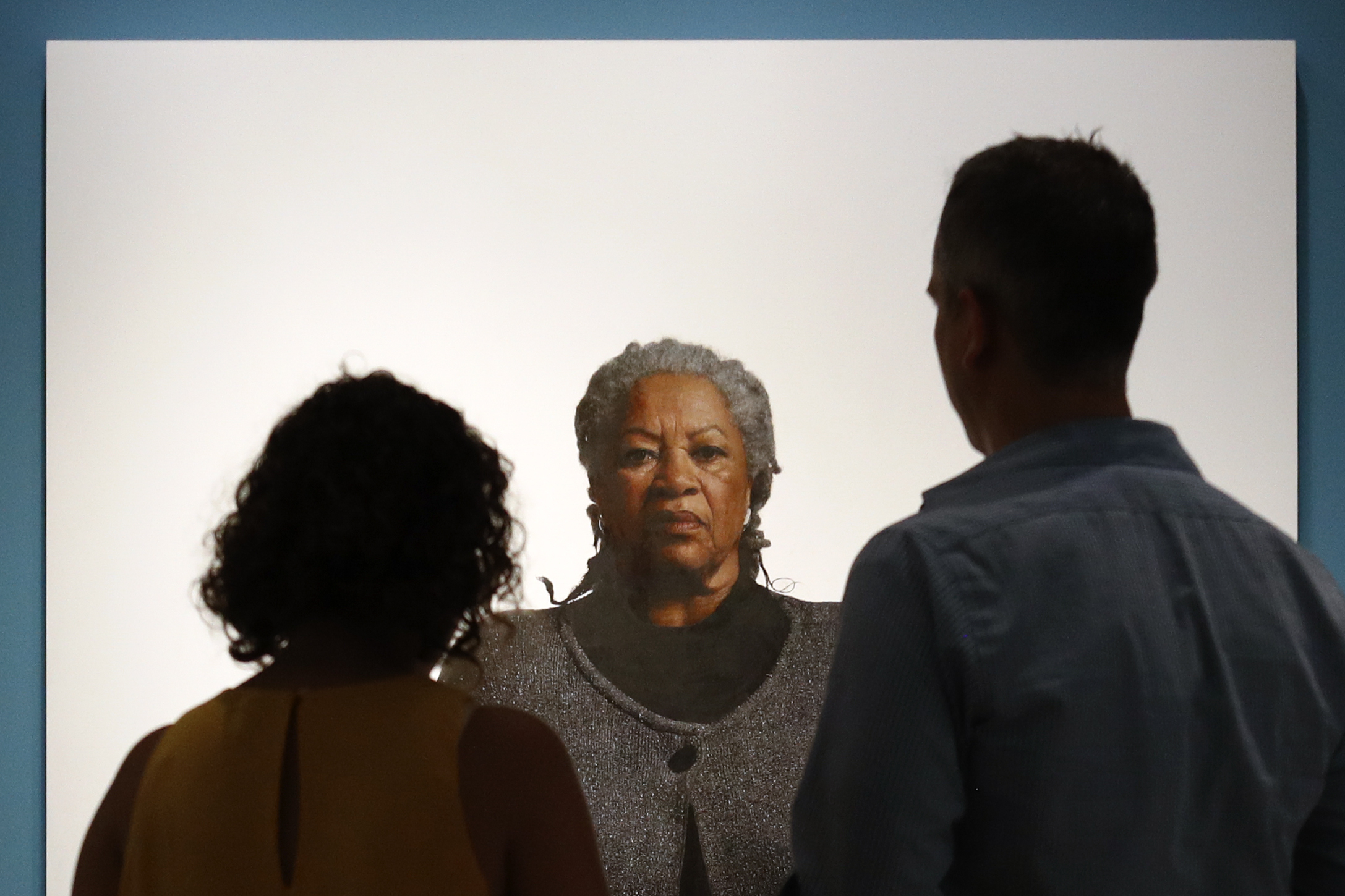Visitors view a portrait of Nobel laureate Toni Morrison