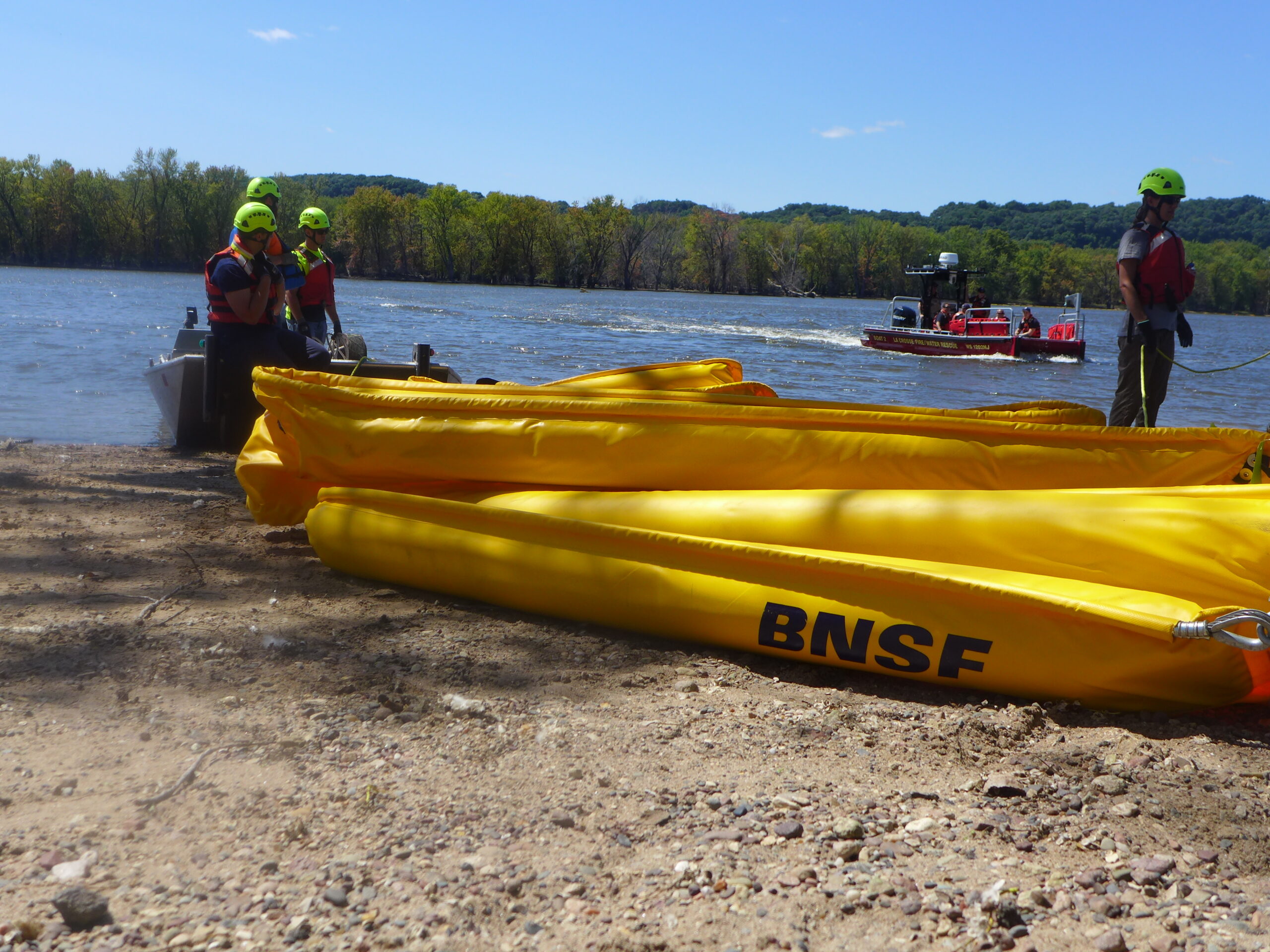 First responders deploy boom on Mississippi river