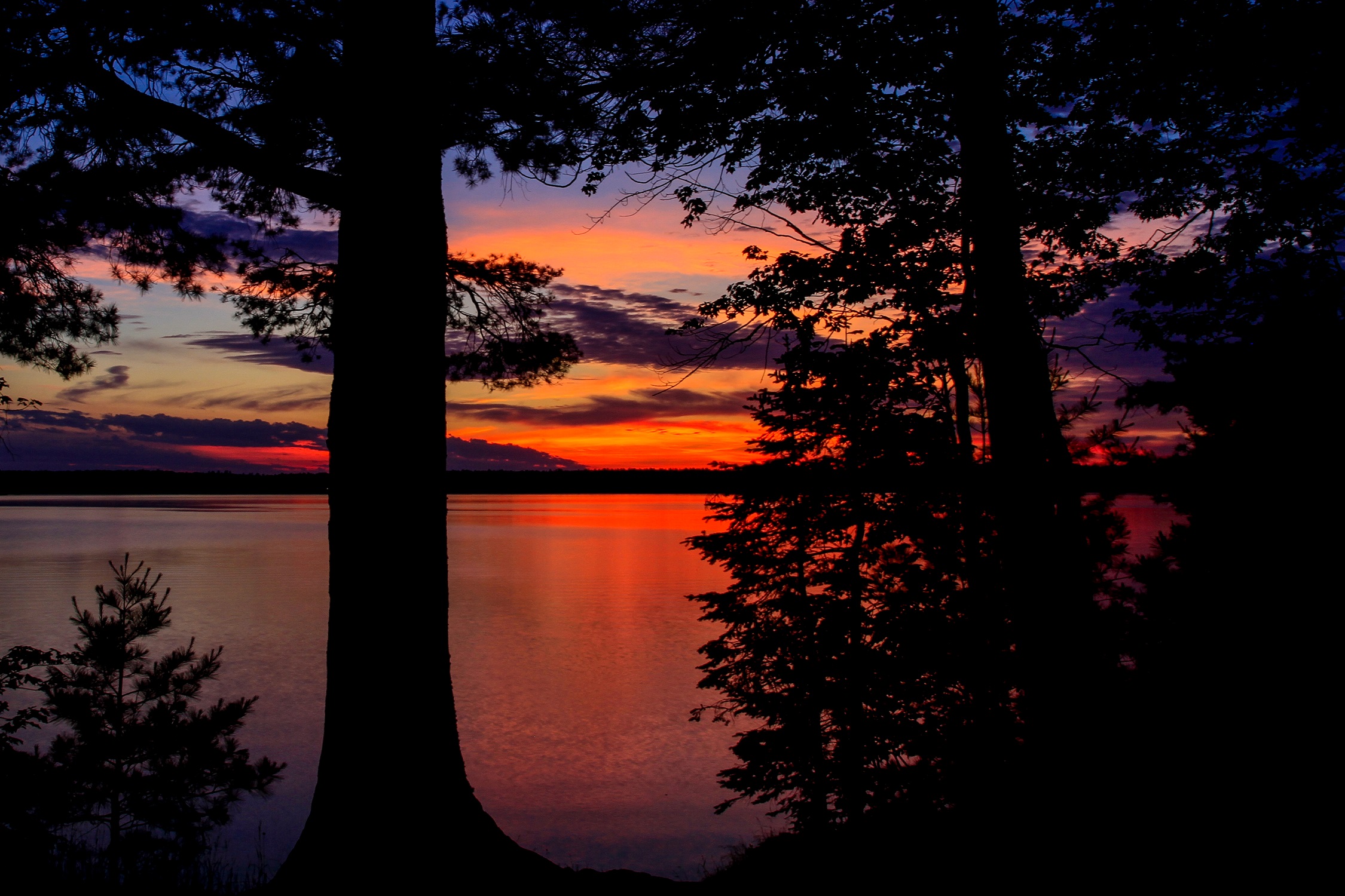 Sunset on a lake in the northwoods of Wisconsin