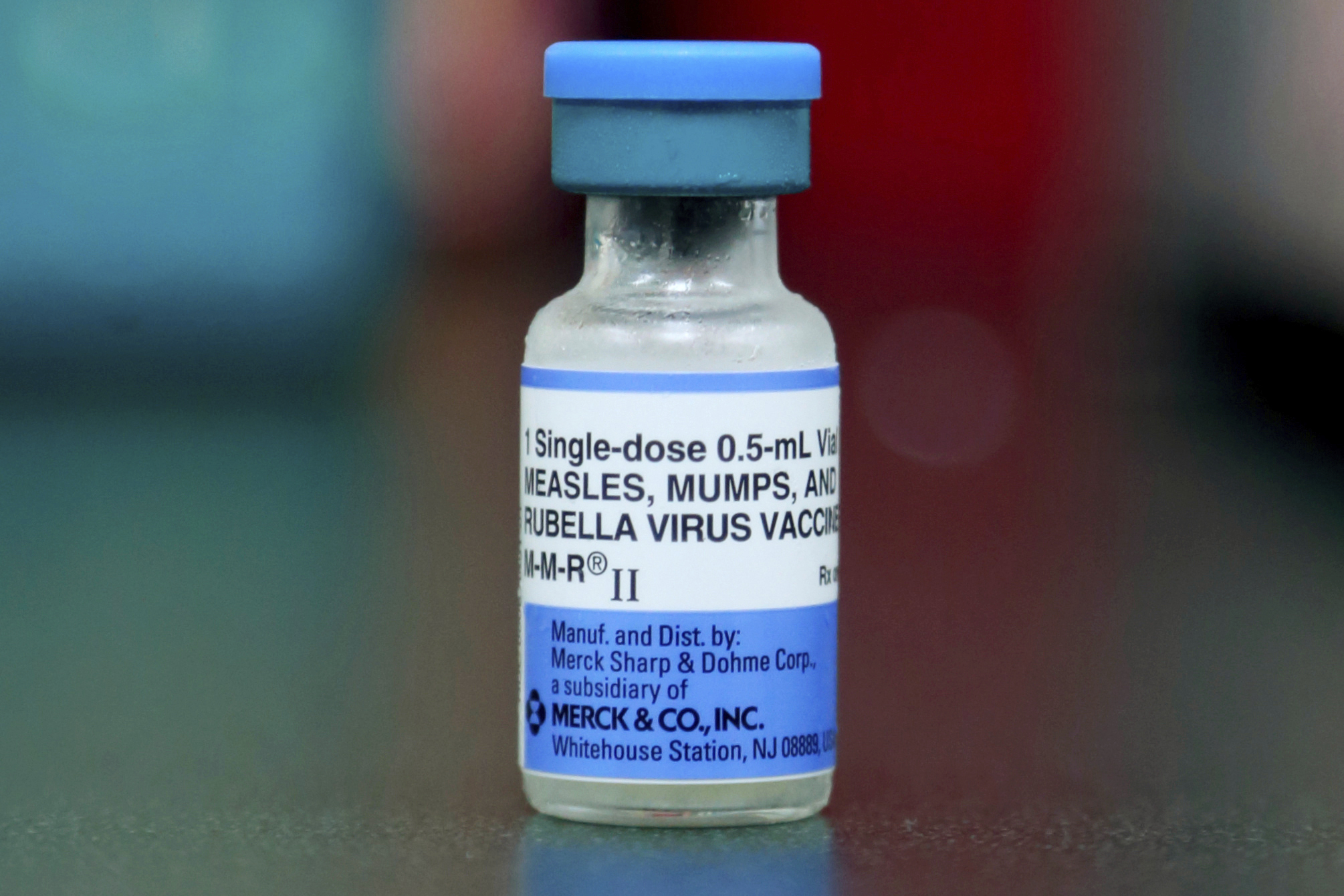 A vial of a measles, mumps and rubella vaccine