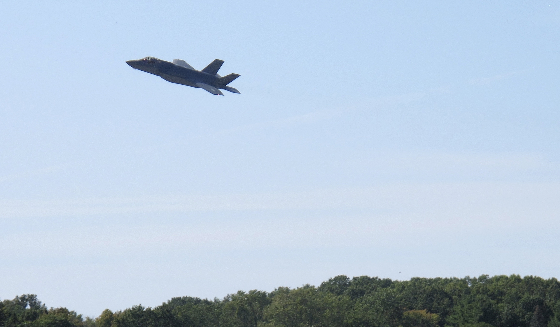 An F-35 fighter jet over the Vermont Air National Guard Base