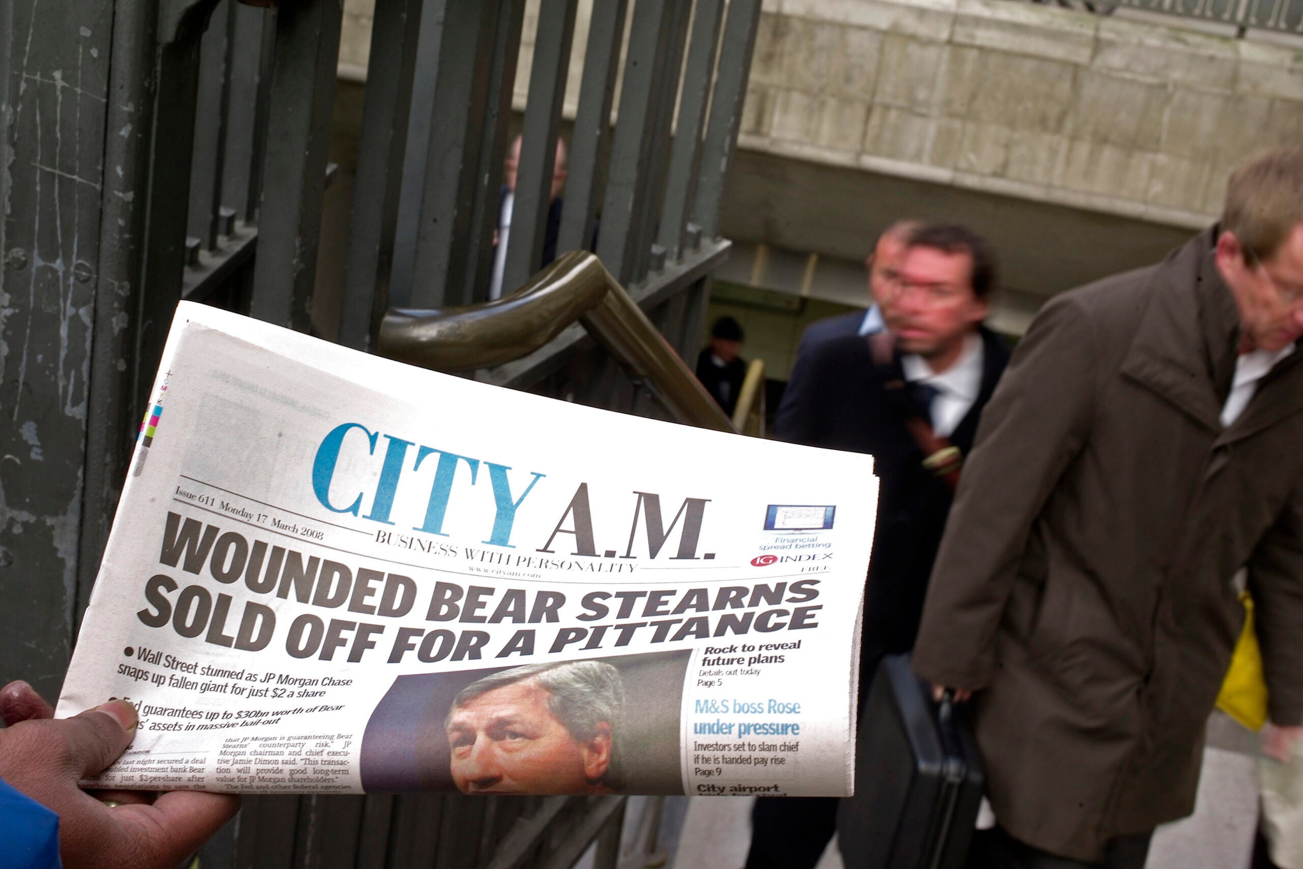 newspaper featuring the sale of U.S. investment bank Bear Stearns