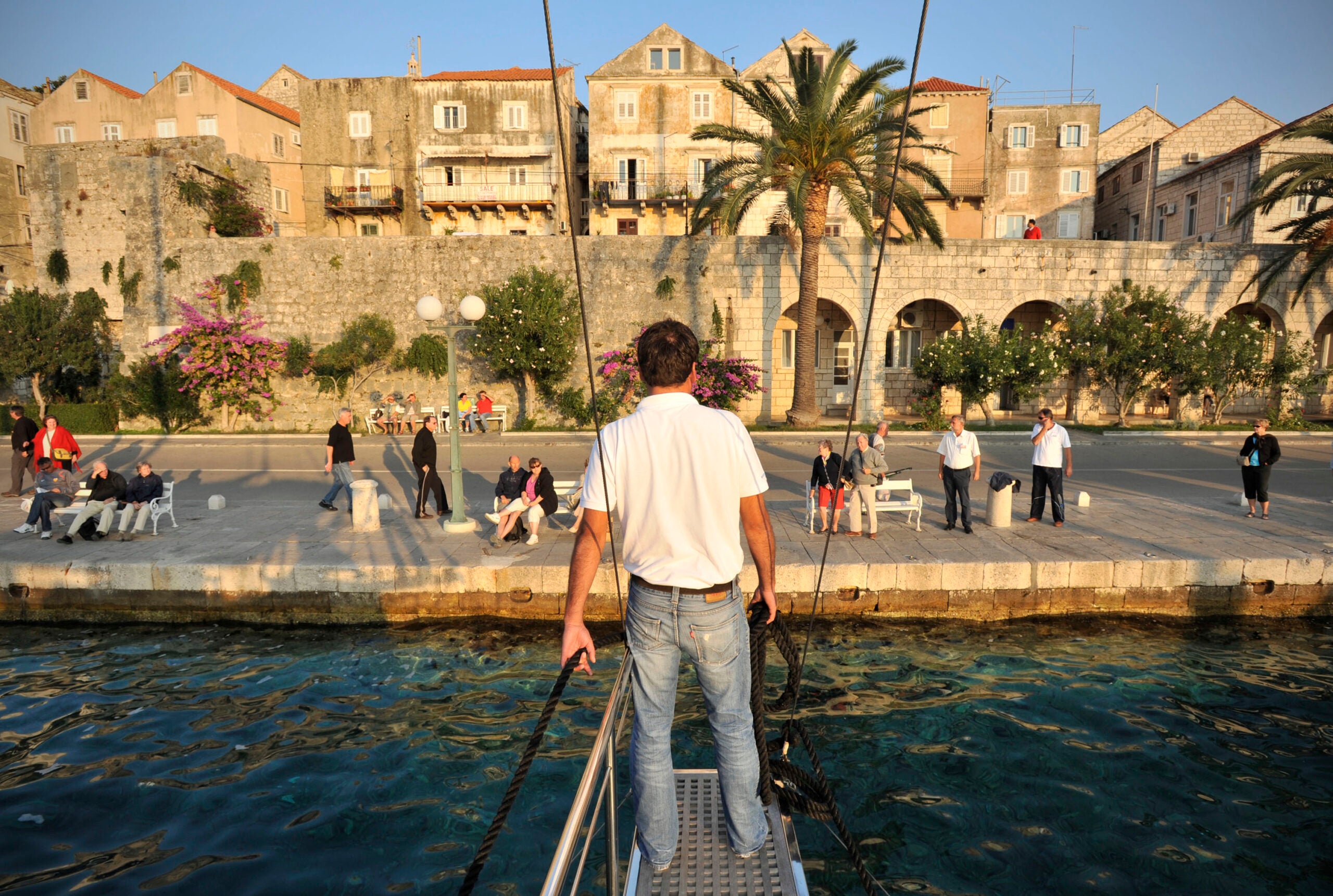 A skipper is ready to dock his Turkish gulet